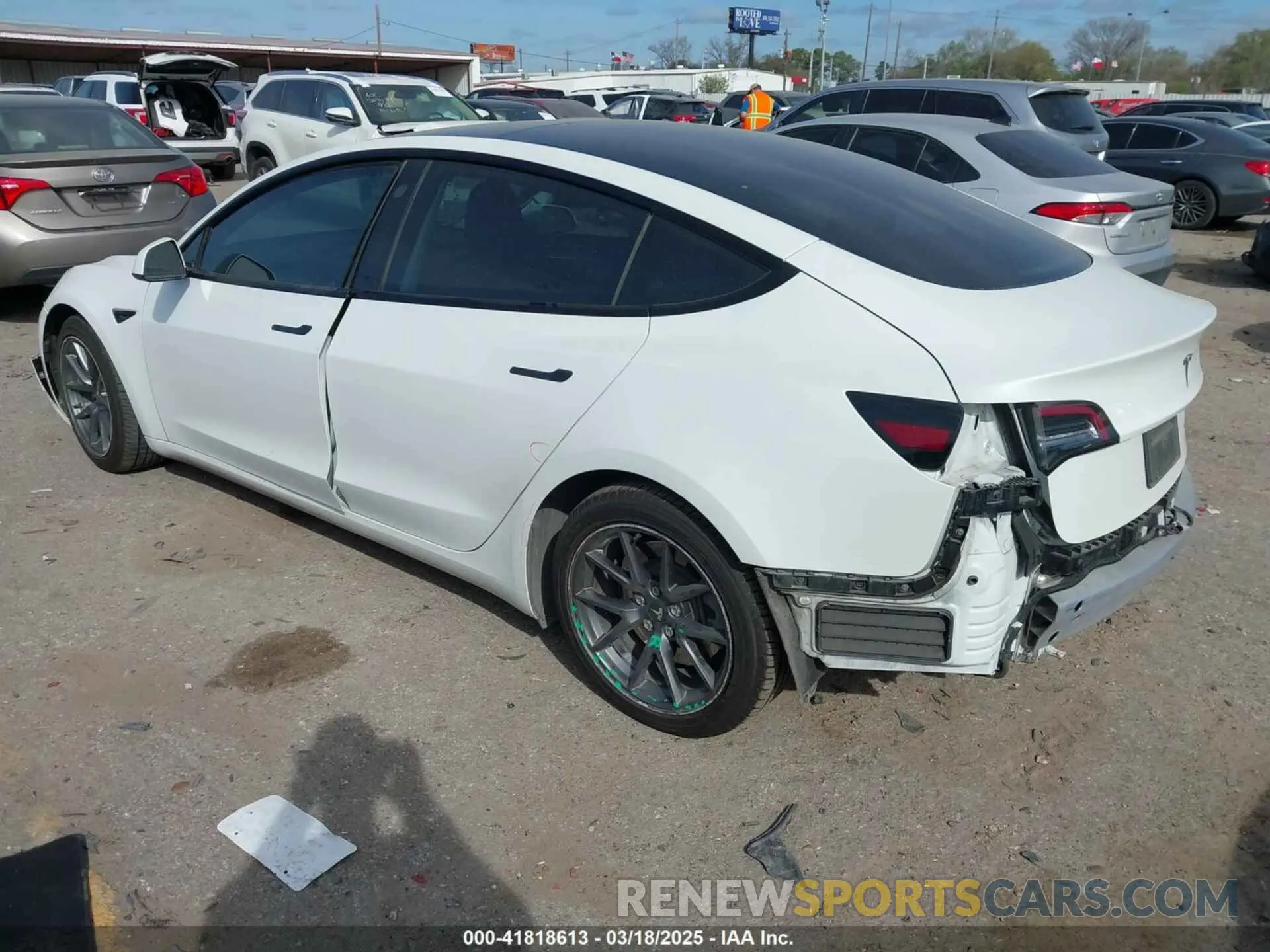 3 Photograph of a damaged car 5YJ3E1EB3NF106448 TESLA MODEL 3 2022