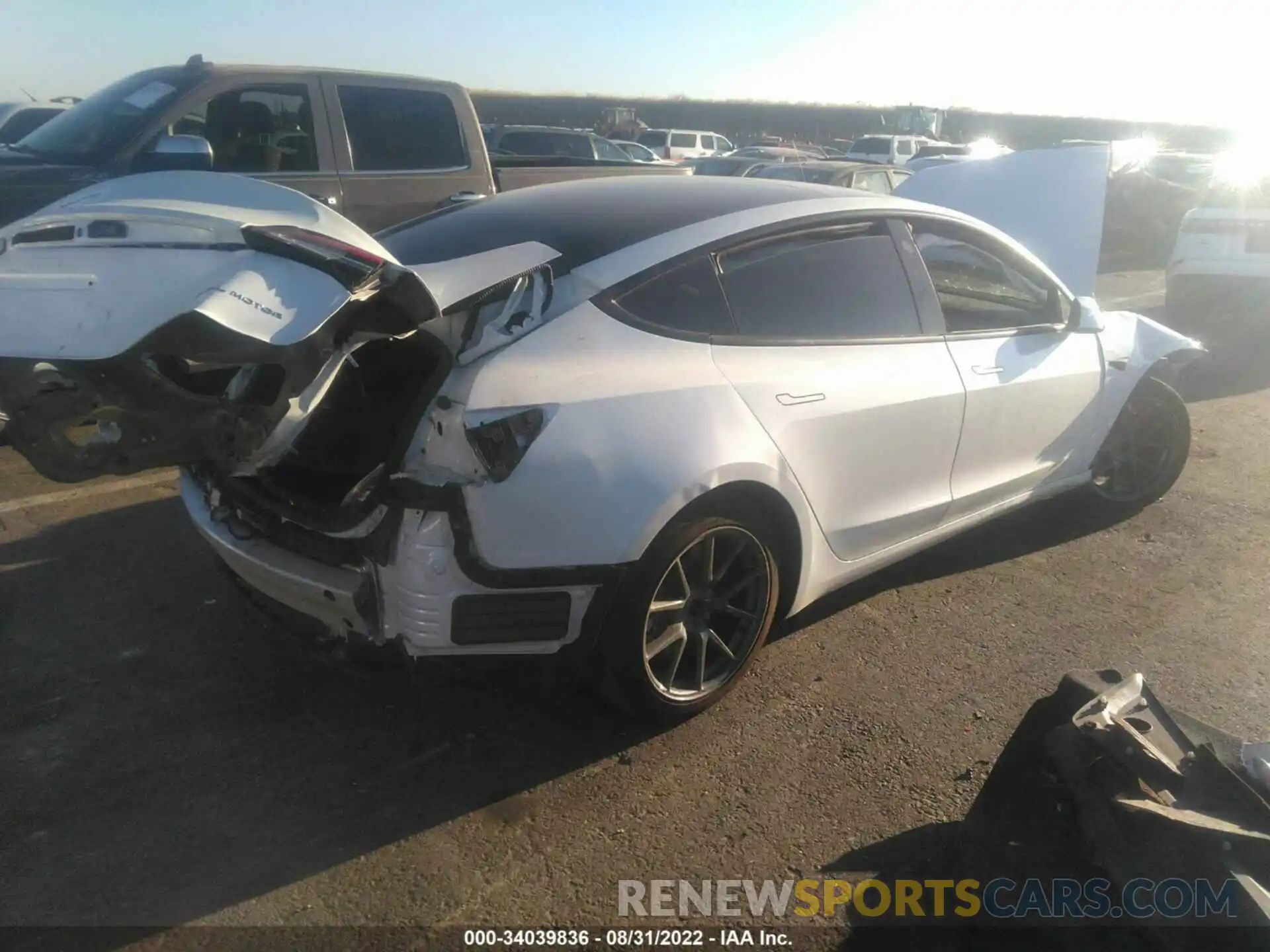 4 Photograph of a damaged car 5YJ3E1EB3NF106983 TESLA MODEL 3 2022