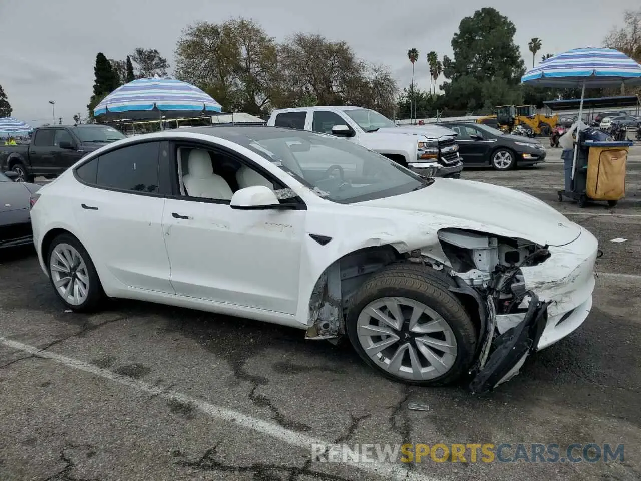 4 Photograph of a damaged car 5YJ3E1EB3NF136551 TESLA MODEL 3 2022