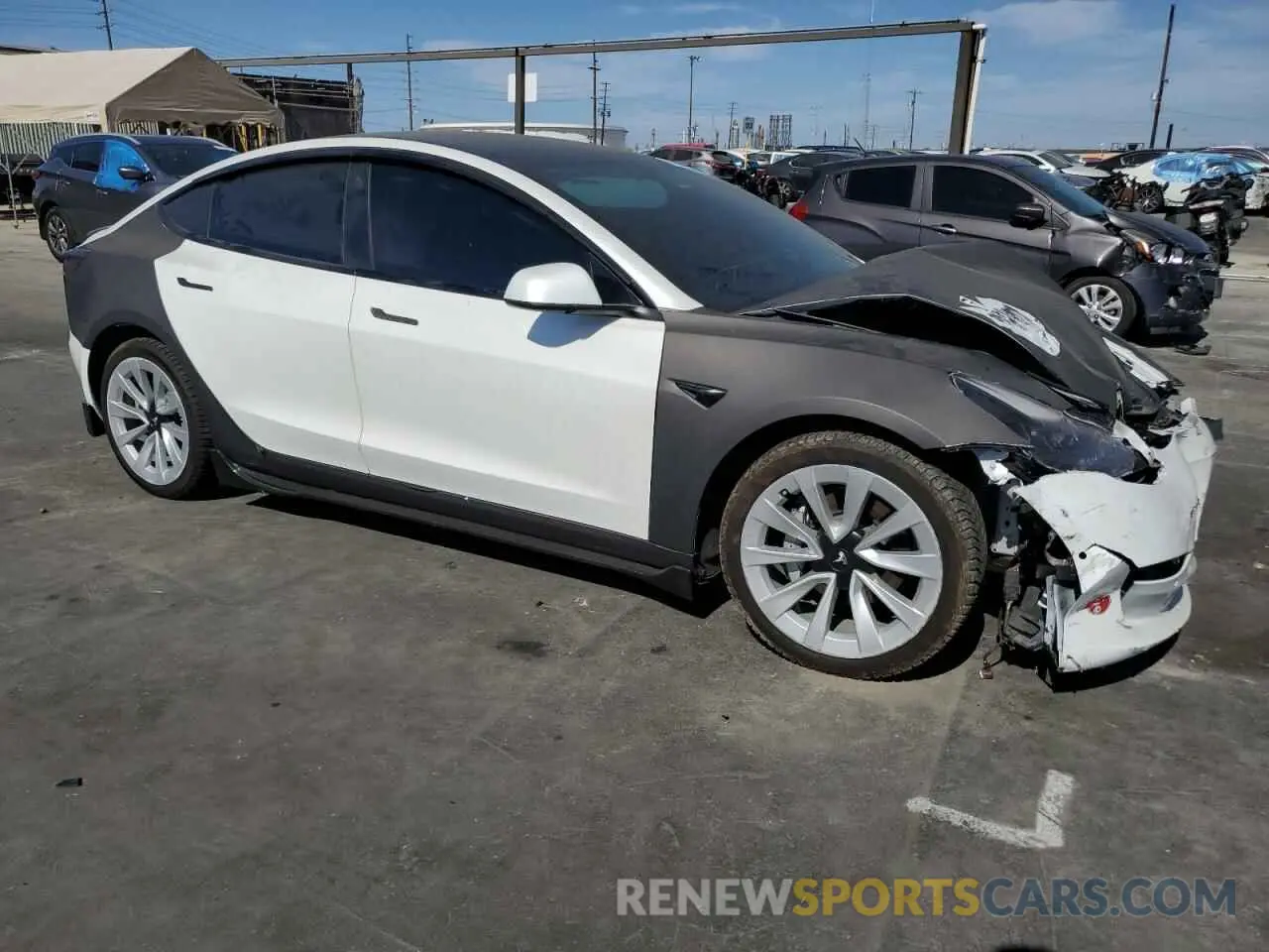 4 Photograph of a damaged car 5YJ3E1EB3NF143581 TESLA MODEL 3 2022