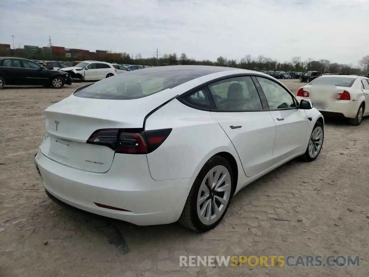 4 Photograph of a damaged car 5YJ3E1EB3NF181621 TESLA MODEL 3 2022