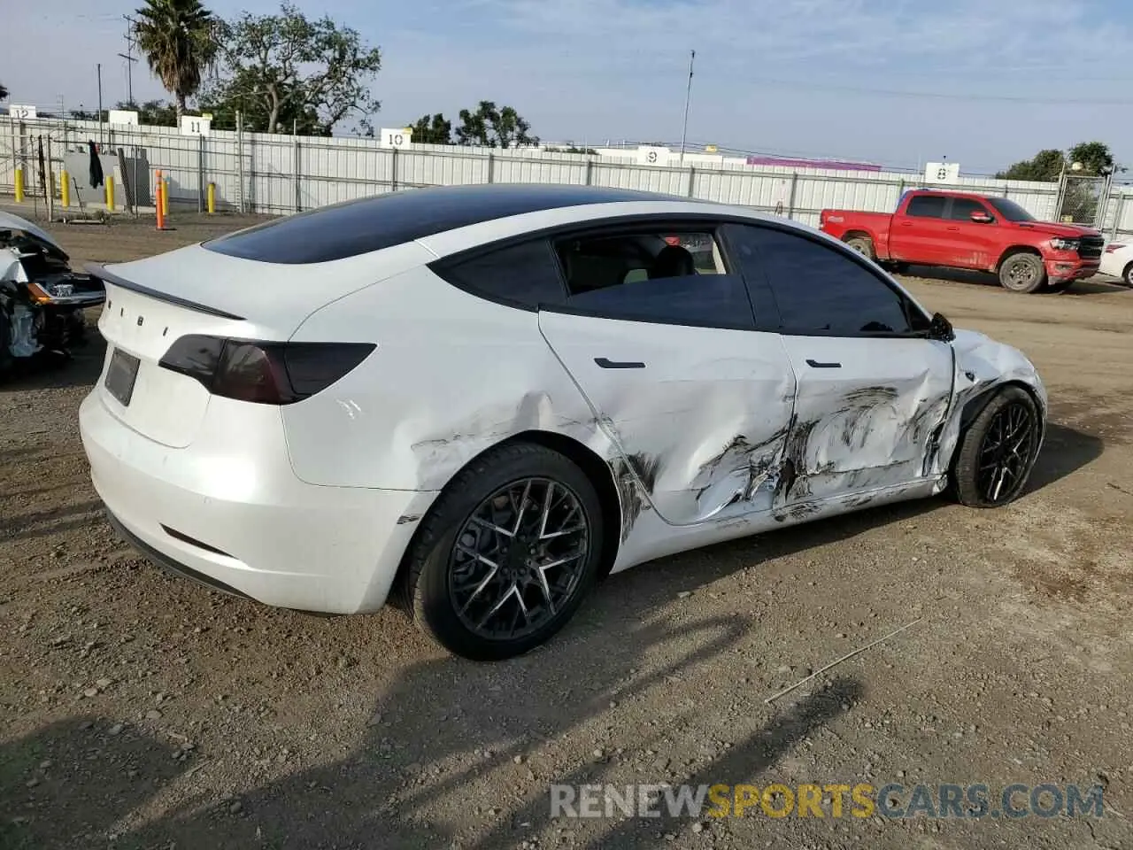 3 Photograph of a damaged car 5YJ3E1EB3NF181909 TESLA MODEL 3 2022