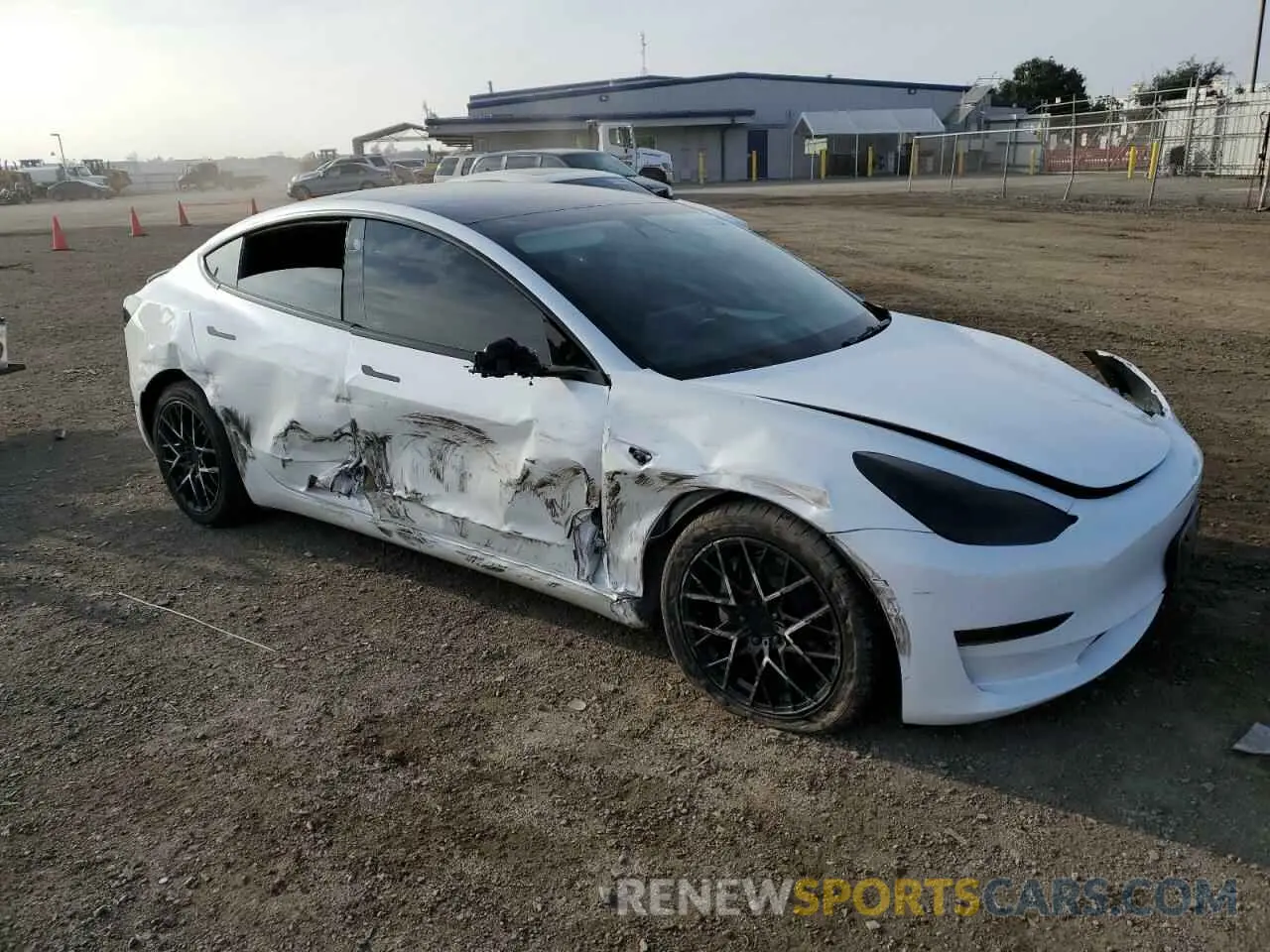 4 Photograph of a damaged car 5YJ3E1EB3NF181909 TESLA MODEL 3 2022