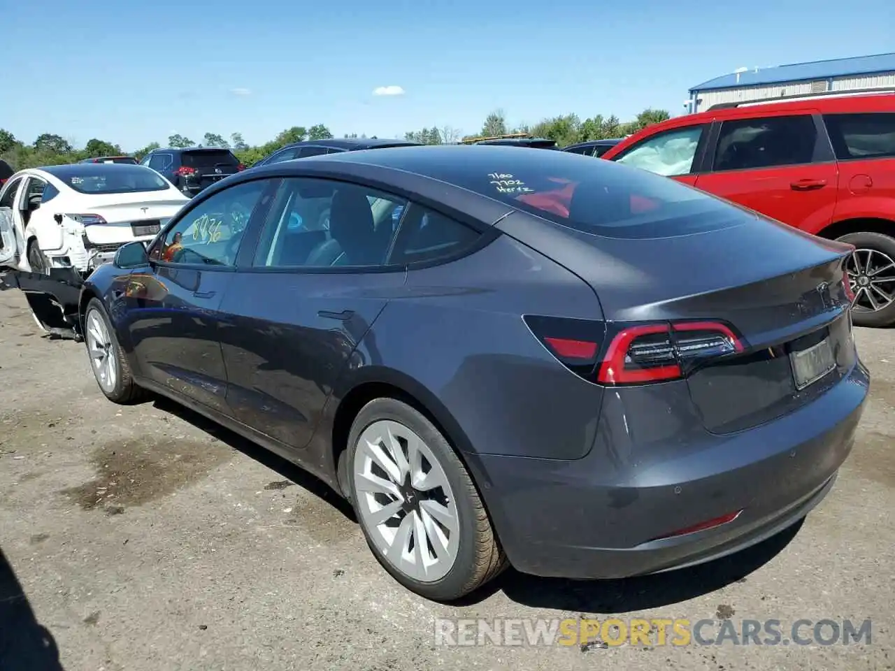 3 Photograph of a damaged car 5YJ3E1EB3NF186561 TESLA MODEL 3 2022