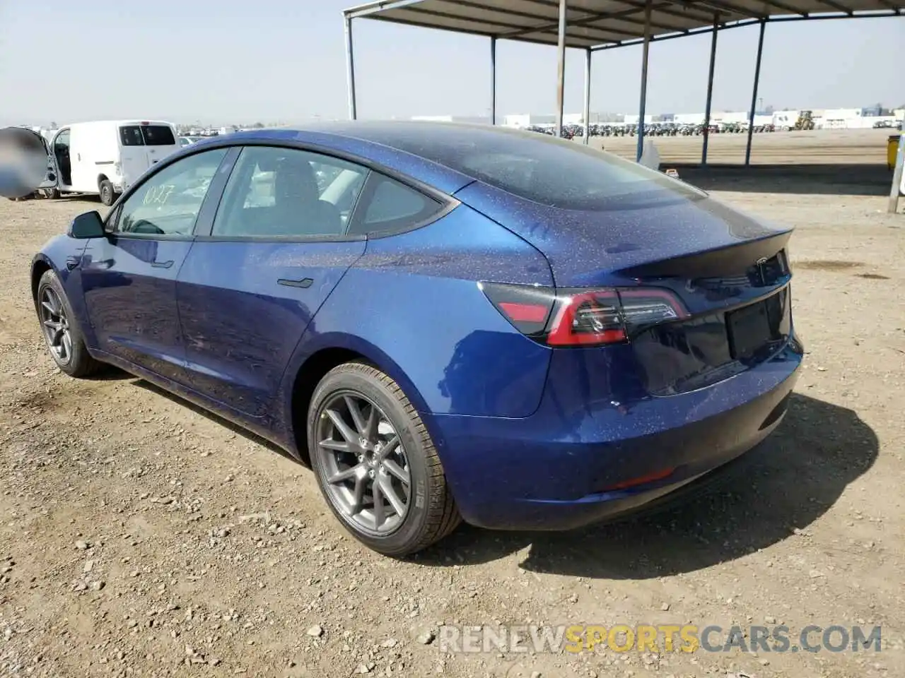 3 Photograph of a damaged car 5YJ3E1EB3NF189069 TESLA MODEL 3 2022