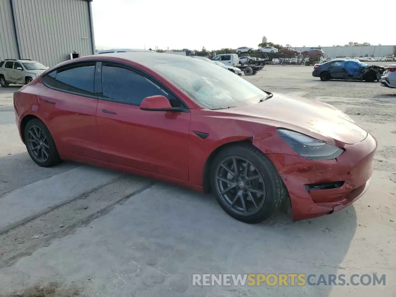 4 Photograph of a damaged car 5YJ3E1EB3NF189752 TESLA MODEL 3 2022