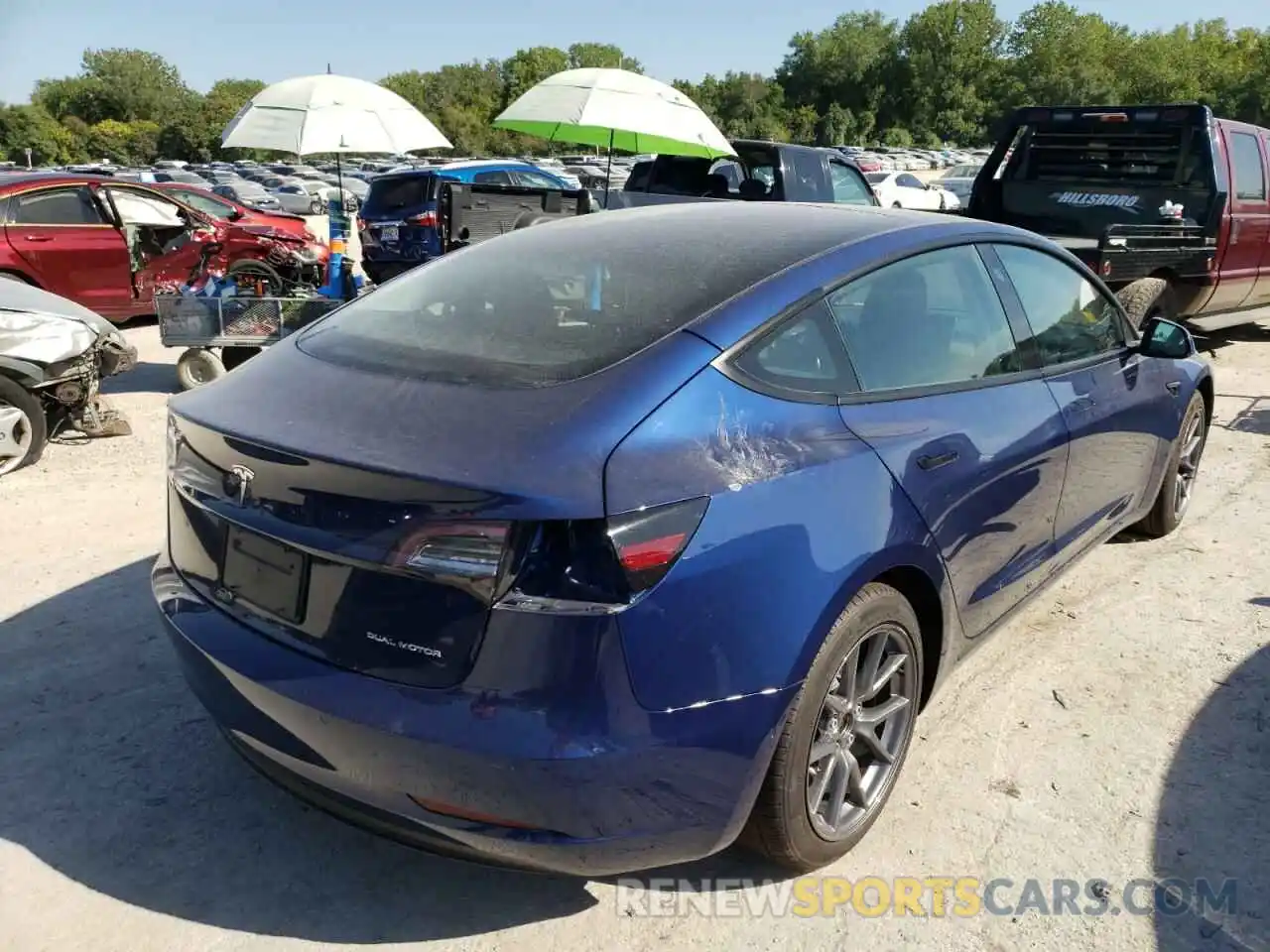 4 Photograph of a damaged car 5YJ3E1EB3NF190903 TESLA MODEL 3 2022