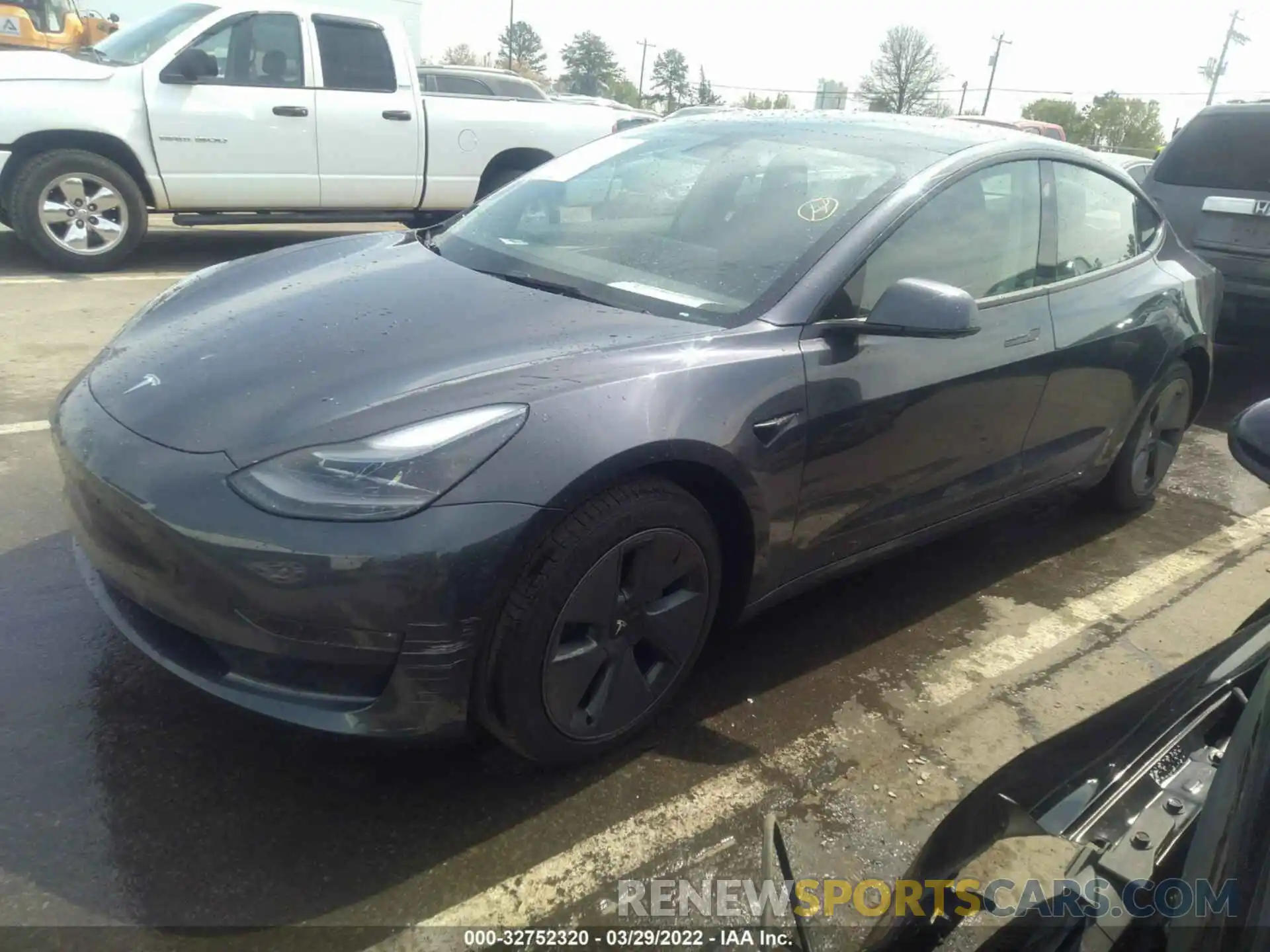 2 Photograph of a damaged car 5YJ3E1EB3NF194093 TESLA MODEL 3 2022