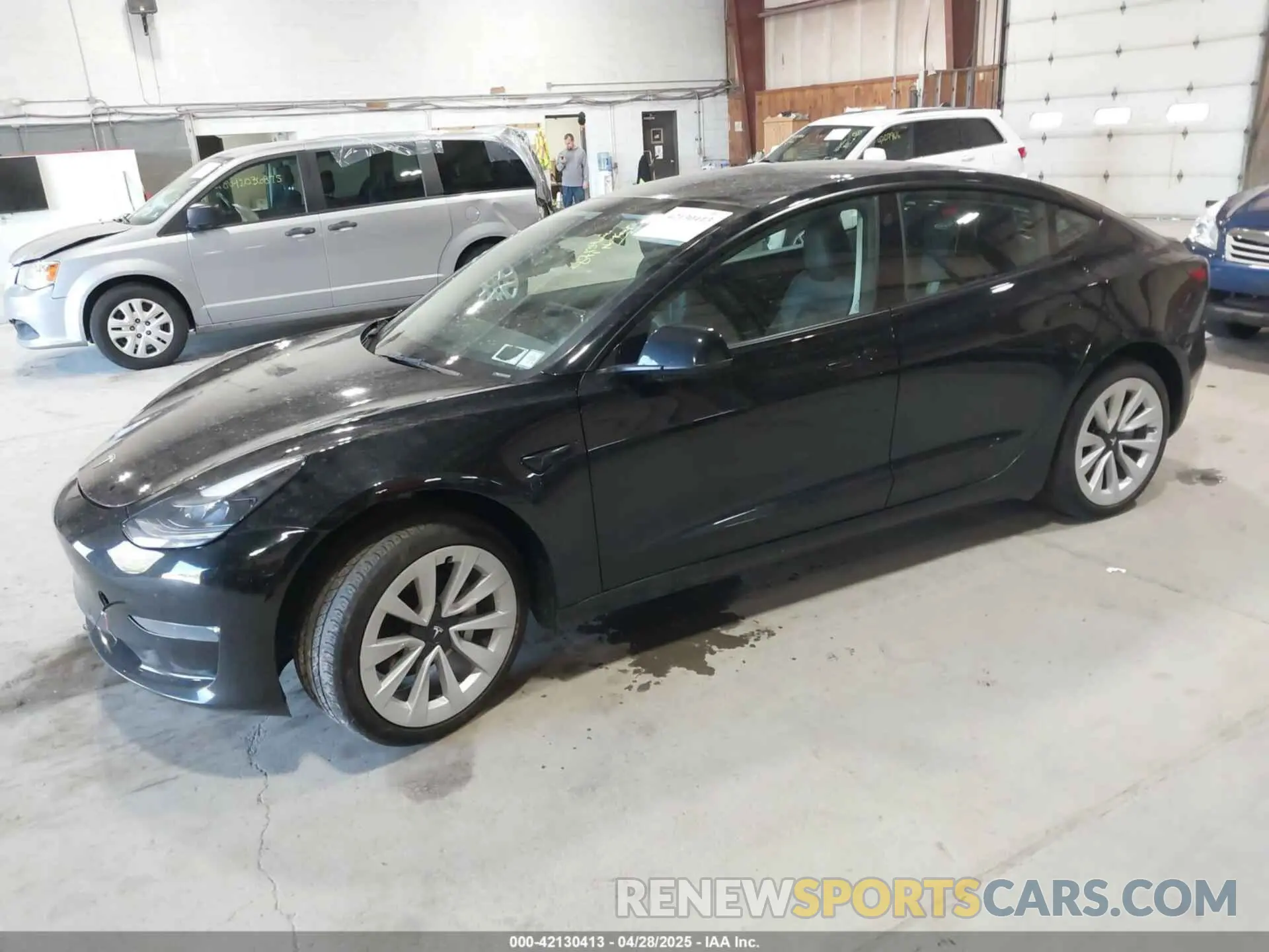 2 Photograph of a damaged car 5YJ3E1EB3NF202760 TESLA MODEL 3 2022