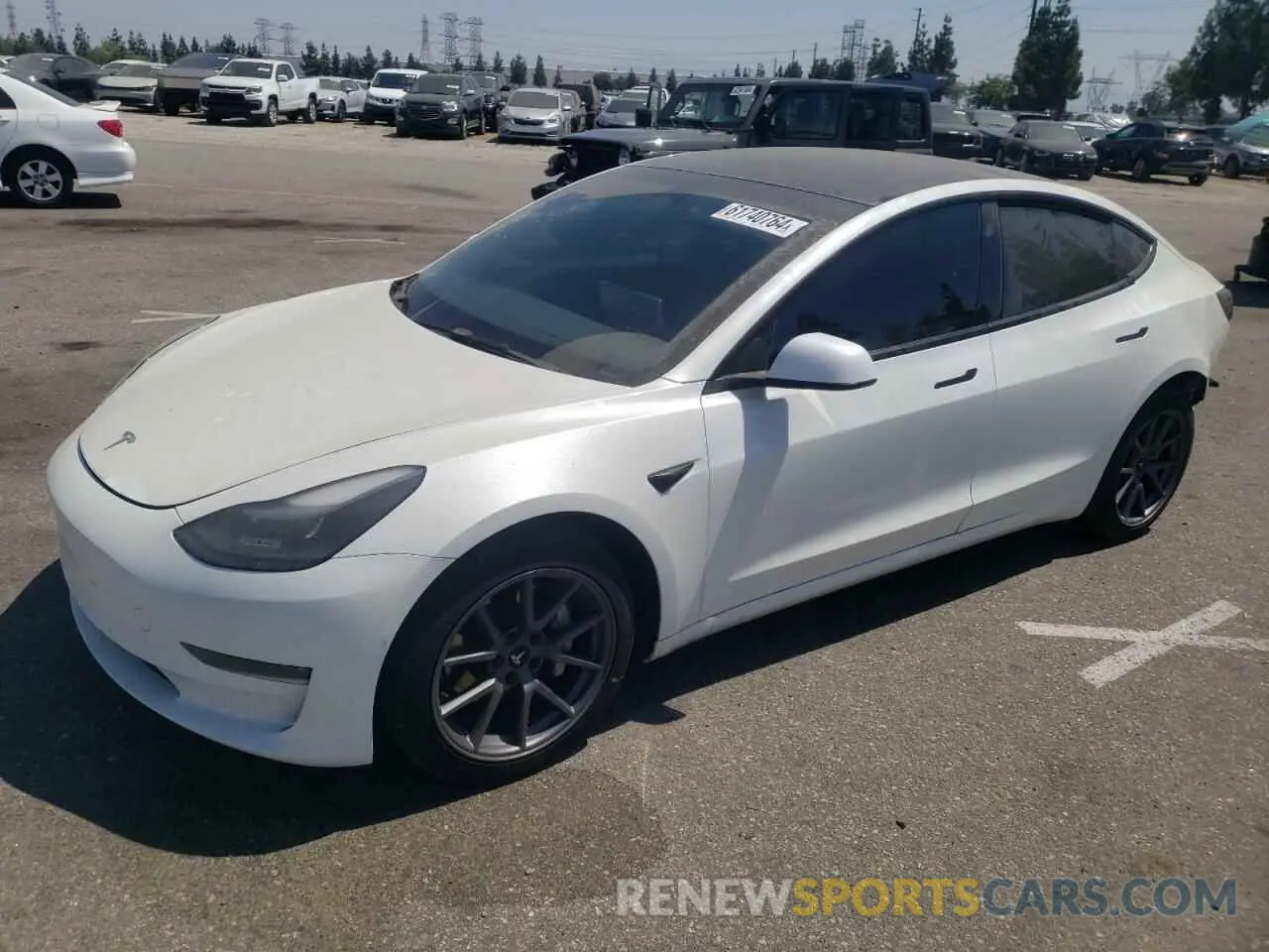 1 Photograph of a damaged car 5YJ3E1EB3NF211961 TESLA MODEL 3 2022