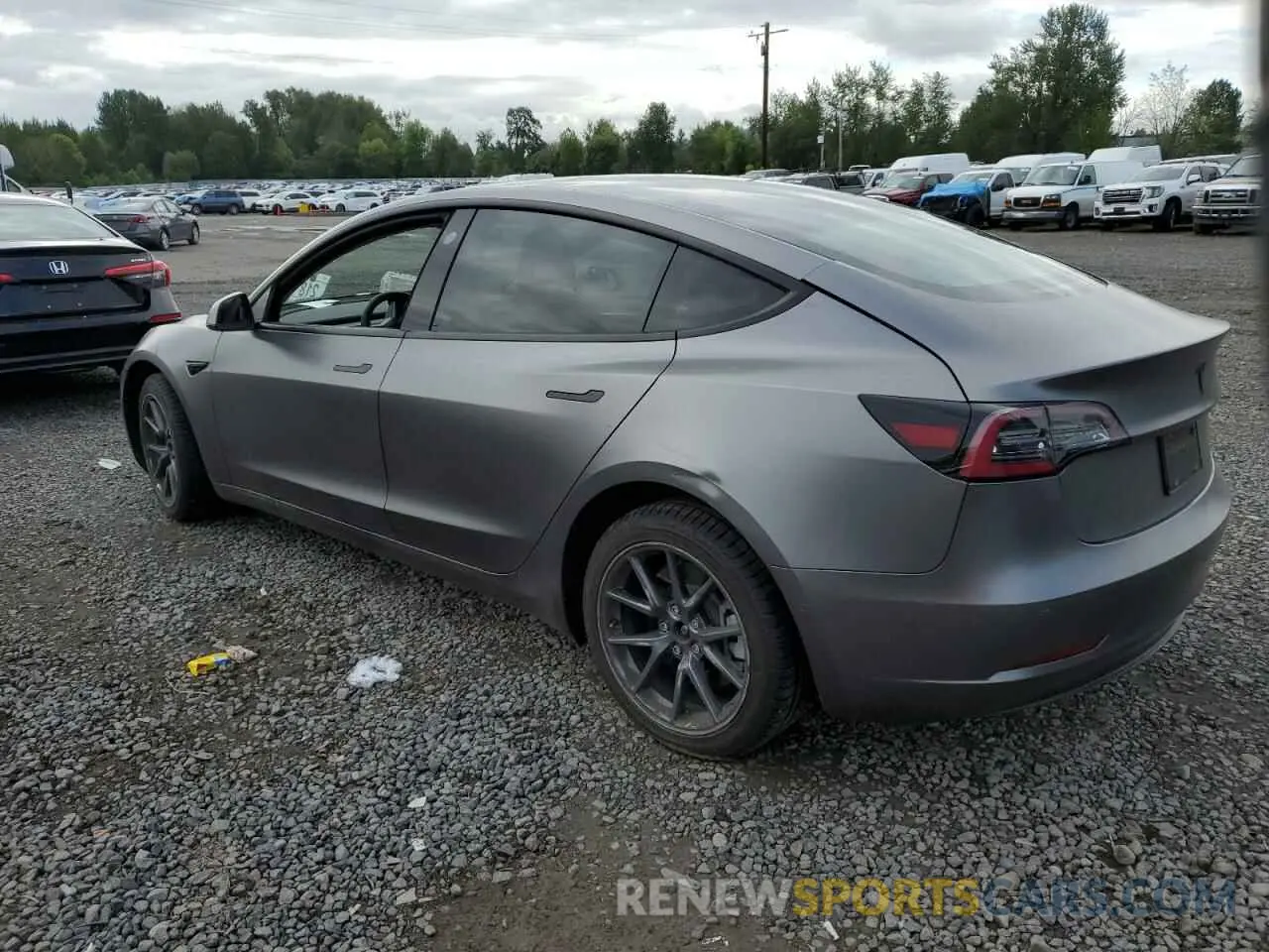 2 Photograph of a damaged car 5YJ3E1EB3NF221891 TESLA MODEL 3 2022