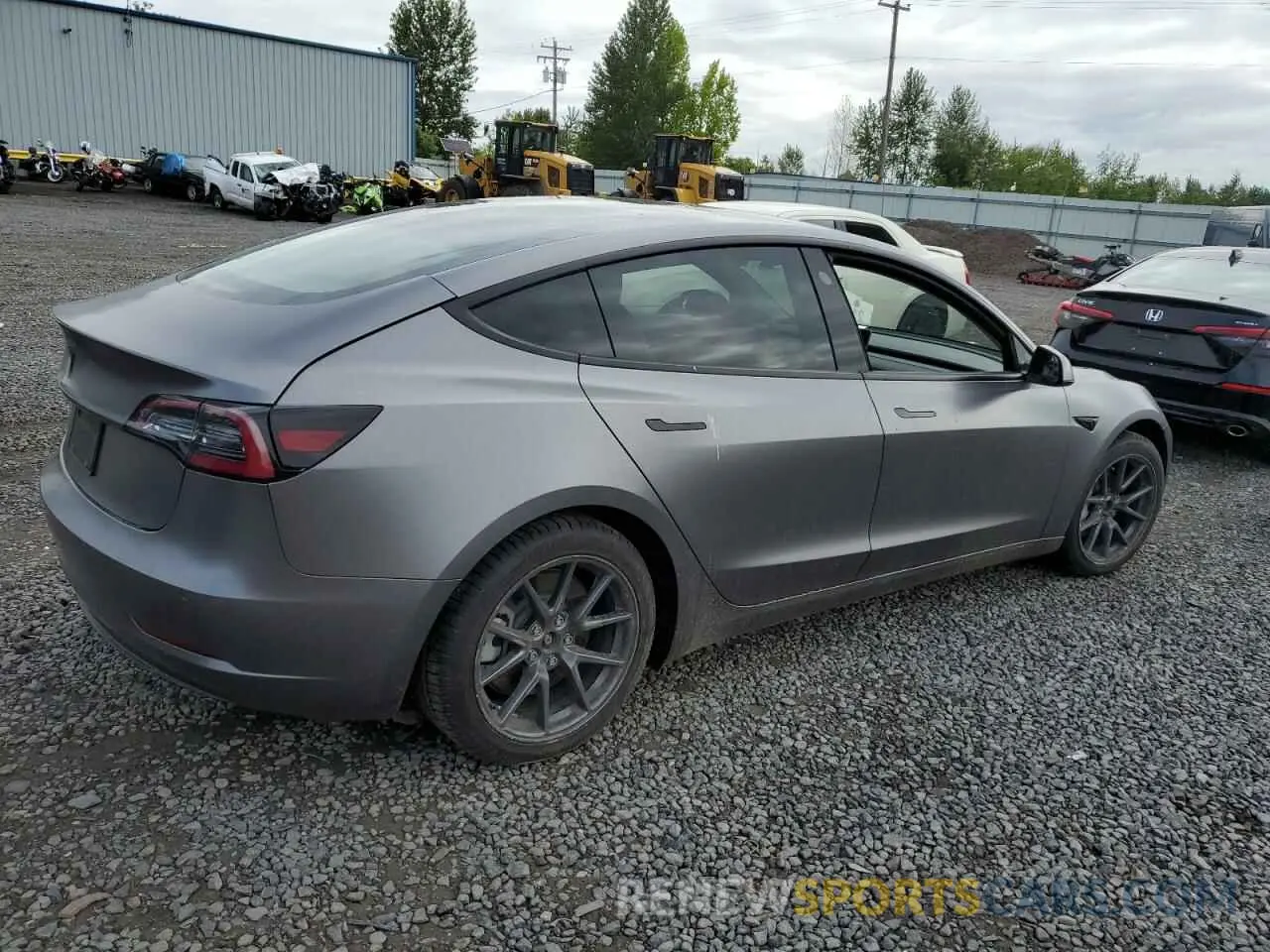 3 Photograph of a damaged car 5YJ3E1EB3NF221891 TESLA MODEL 3 2022