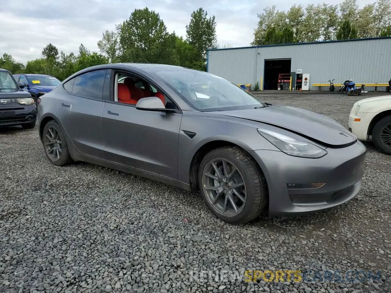 4 Photograph of a damaged car 5YJ3E1EB3NF221891 TESLA MODEL 3 2022