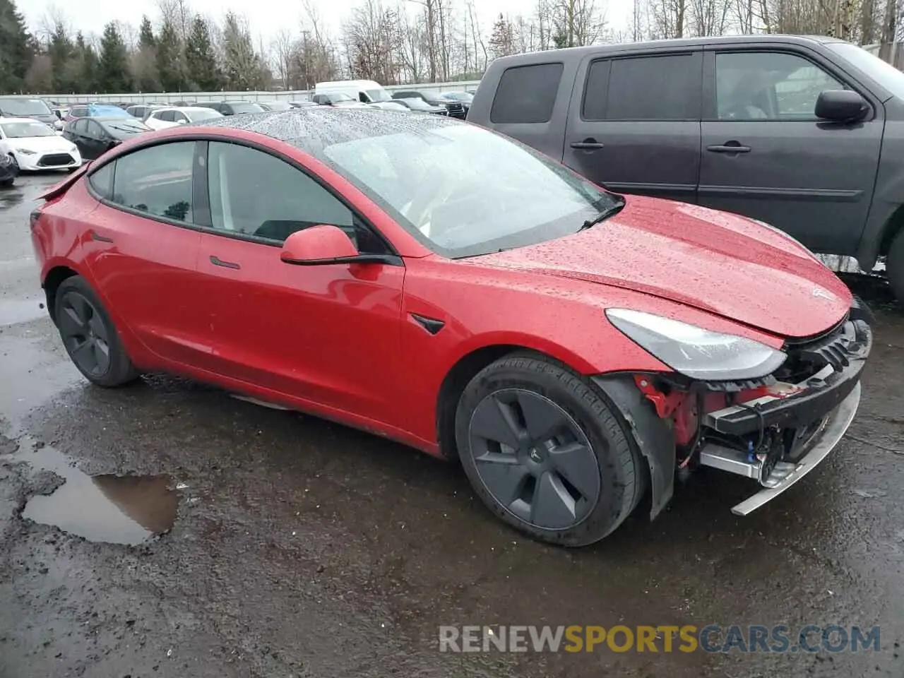 4 Photograph of a damaged car 5YJ3E1EB3NF238058 TESLA MODEL 3 2022