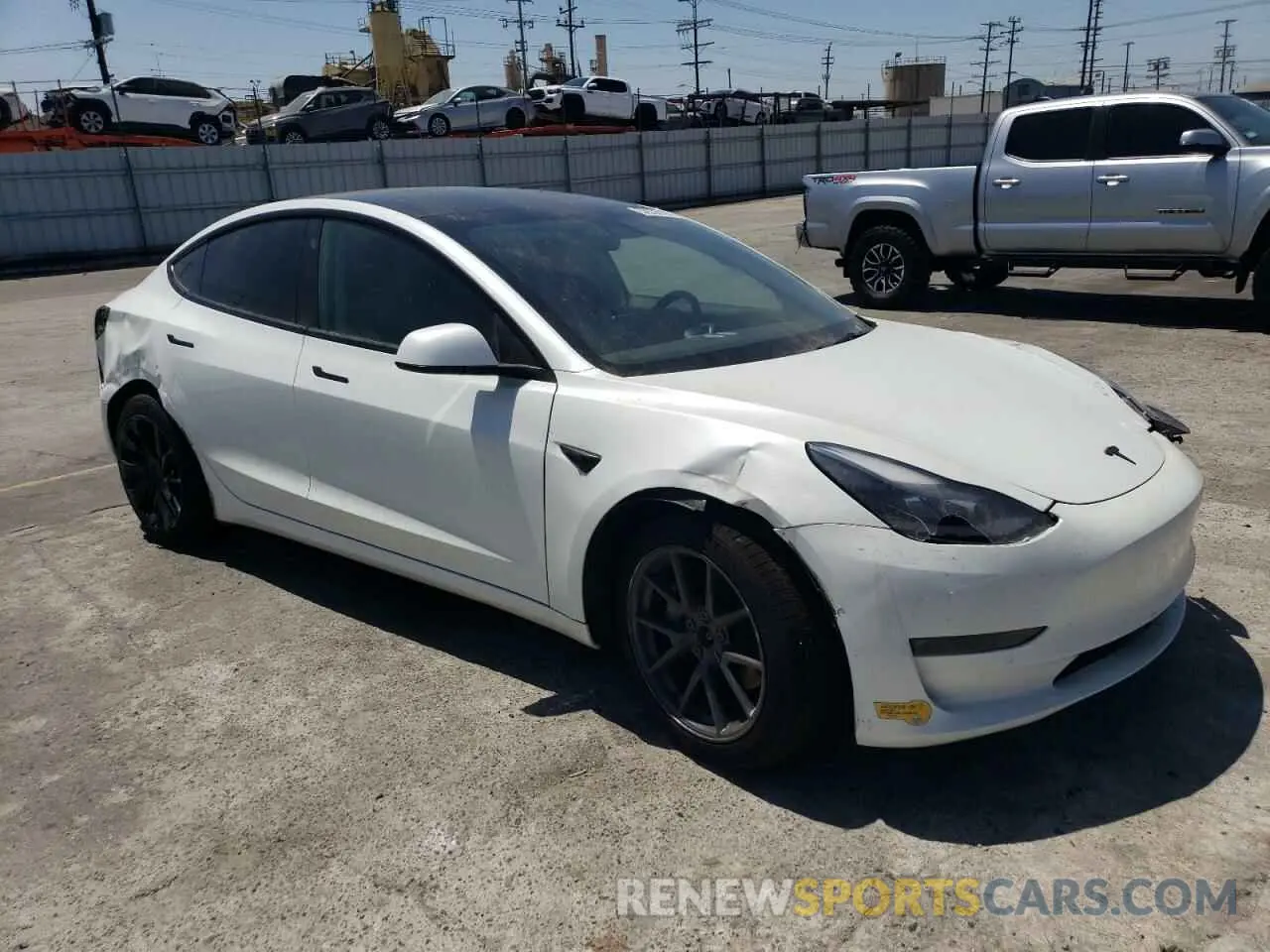 4 Photograph of a damaged car 5YJ3E1EB3NF253434 TESLA MODEL 3 2022
