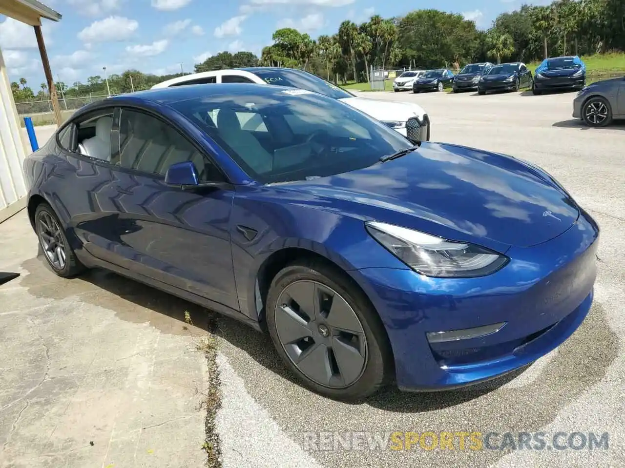 4 Photograph of a damaged car 5YJ3E1EB3NF268340 TESLA MODEL 3 2022