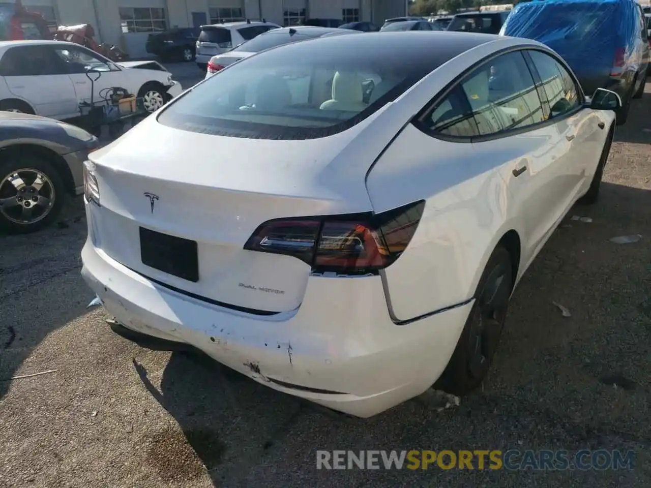 4 Photograph of a damaged car 5YJ3E1EB3NF271206 TESLA MODEL 3 2022