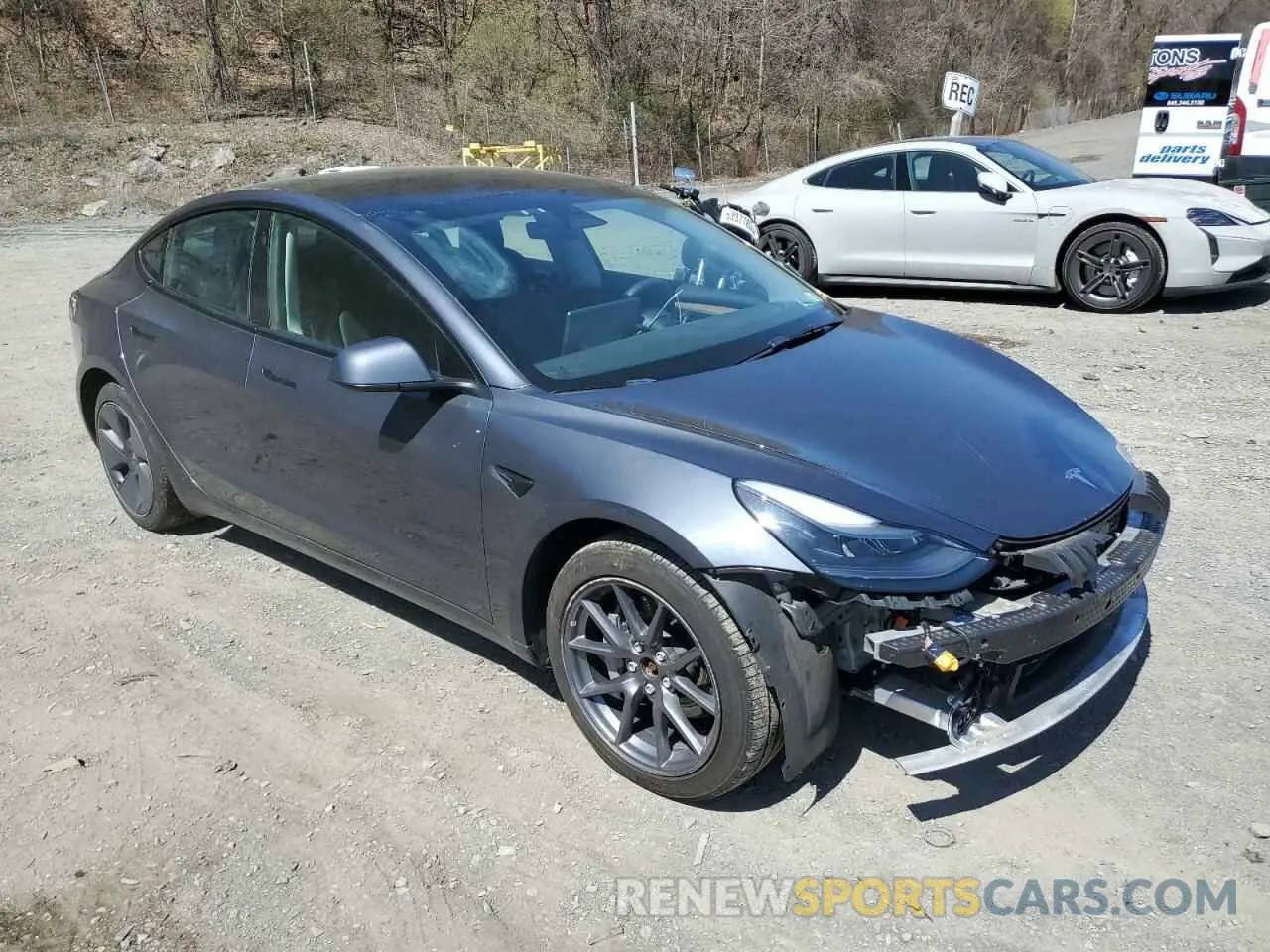 4 Photograph of a damaged car 5YJ3E1EB3NF275319 TESLA MODEL 3 2022