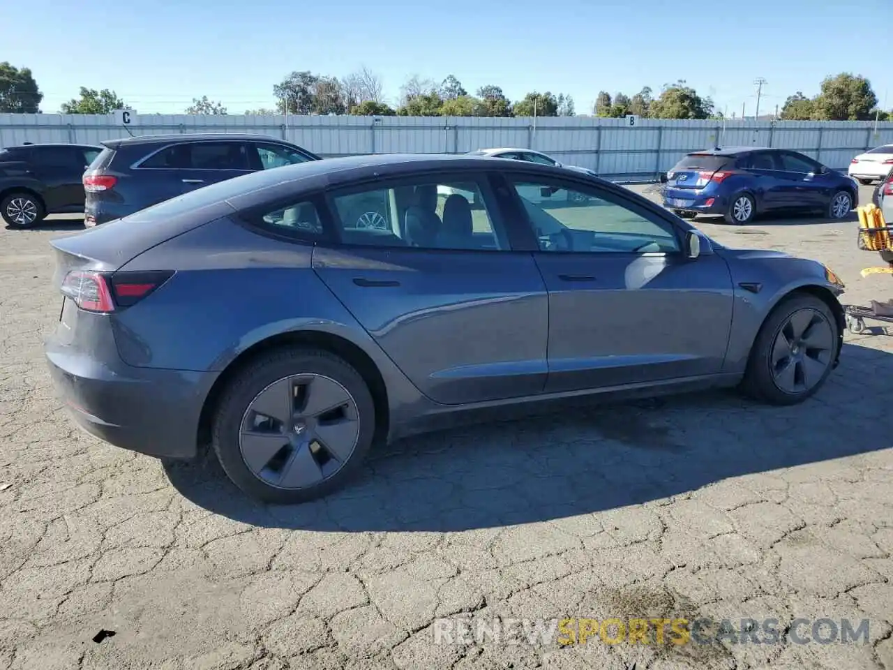 3 Photograph of a damaged car 5YJ3E1EB3NF345420 TESLA MODEL 3 2022