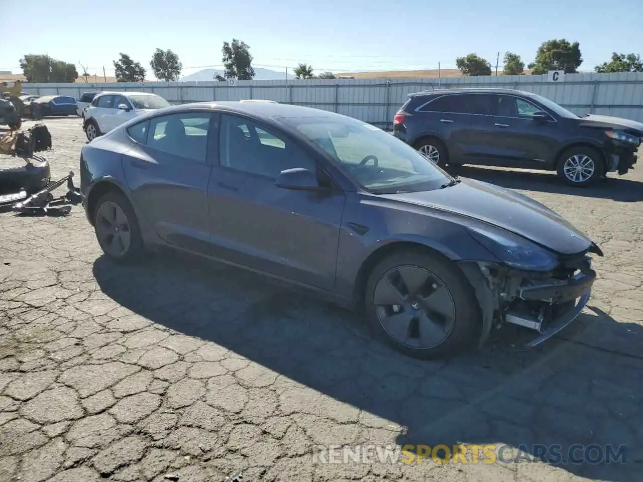 4 Photograph of a damaged car 5YJ3E1EB3NF345420 TESLA MODEL 3 2022