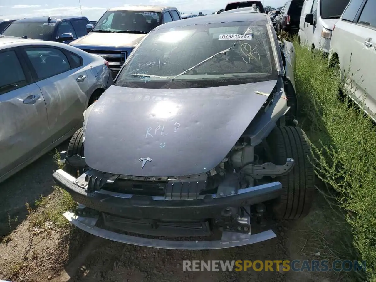 5 Photograph of a damaged car 5YJ3E1EB3NF360869 TESLA MODEL 3 2022