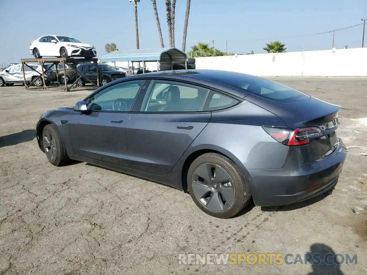 2 Photograph of a damaged car 5YJ3E1EB4NF108676 TESLA MODEL 3 2022