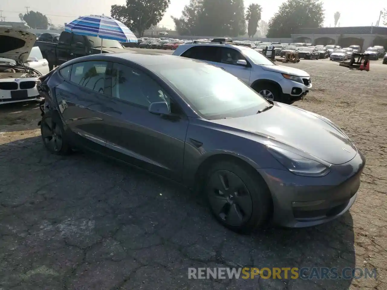 4 Photograph of a damaged car 5YJ3E1EB4NF108676 TESLA MODEL 3 2022