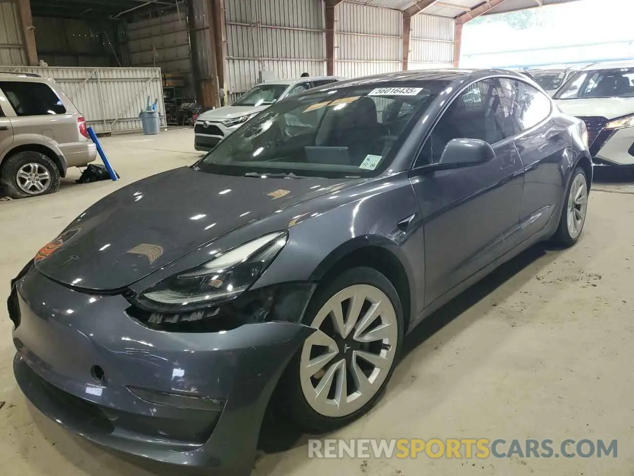 1 Photograph of a damaged car 5YJ3E1EB4NF118513 TESLA MODEL 3 2022