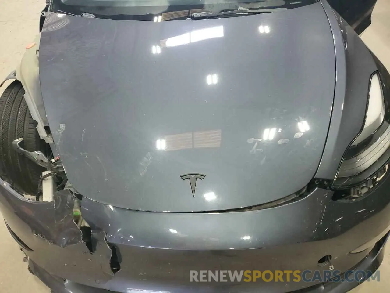 11 Photograph of a damaged car 5YJ3E1EB4NF118513 TESLA MODEL 3 2022