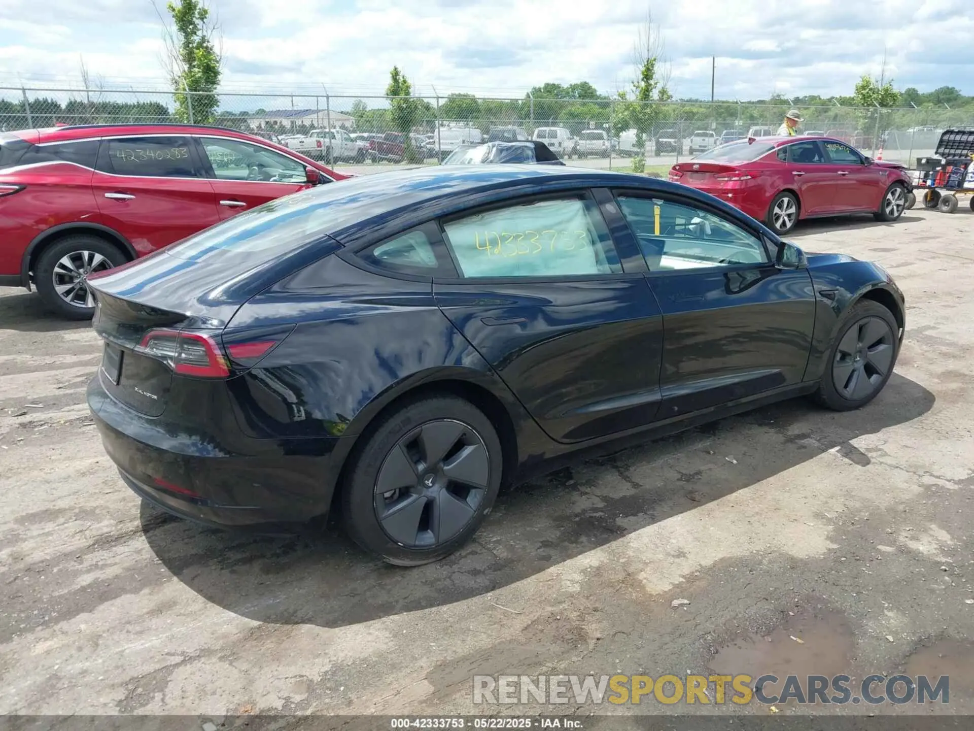 4 Photograph of a damaged car 5YJ3E1EB4NF120875 TESLA MODEL 3 2022