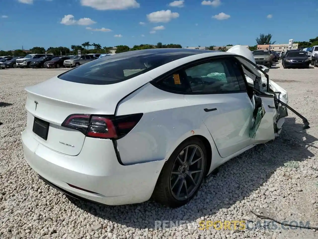 4 Photograph of a damaged car 5YJ3E1EB4NF129060 TESLA MODEL 3 2022