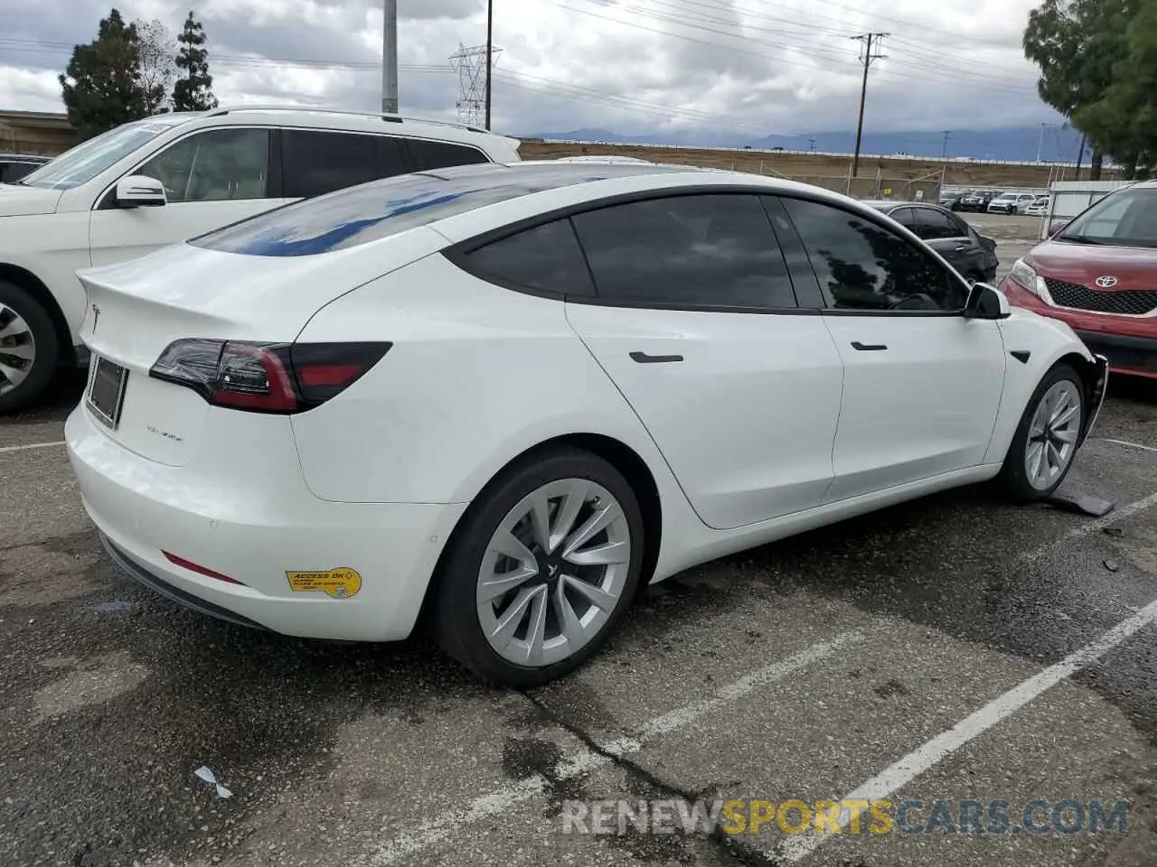 3 Photograph of a damaged car 5YJ3E1EB4NF129995 TESLA MODEL 3 2022
