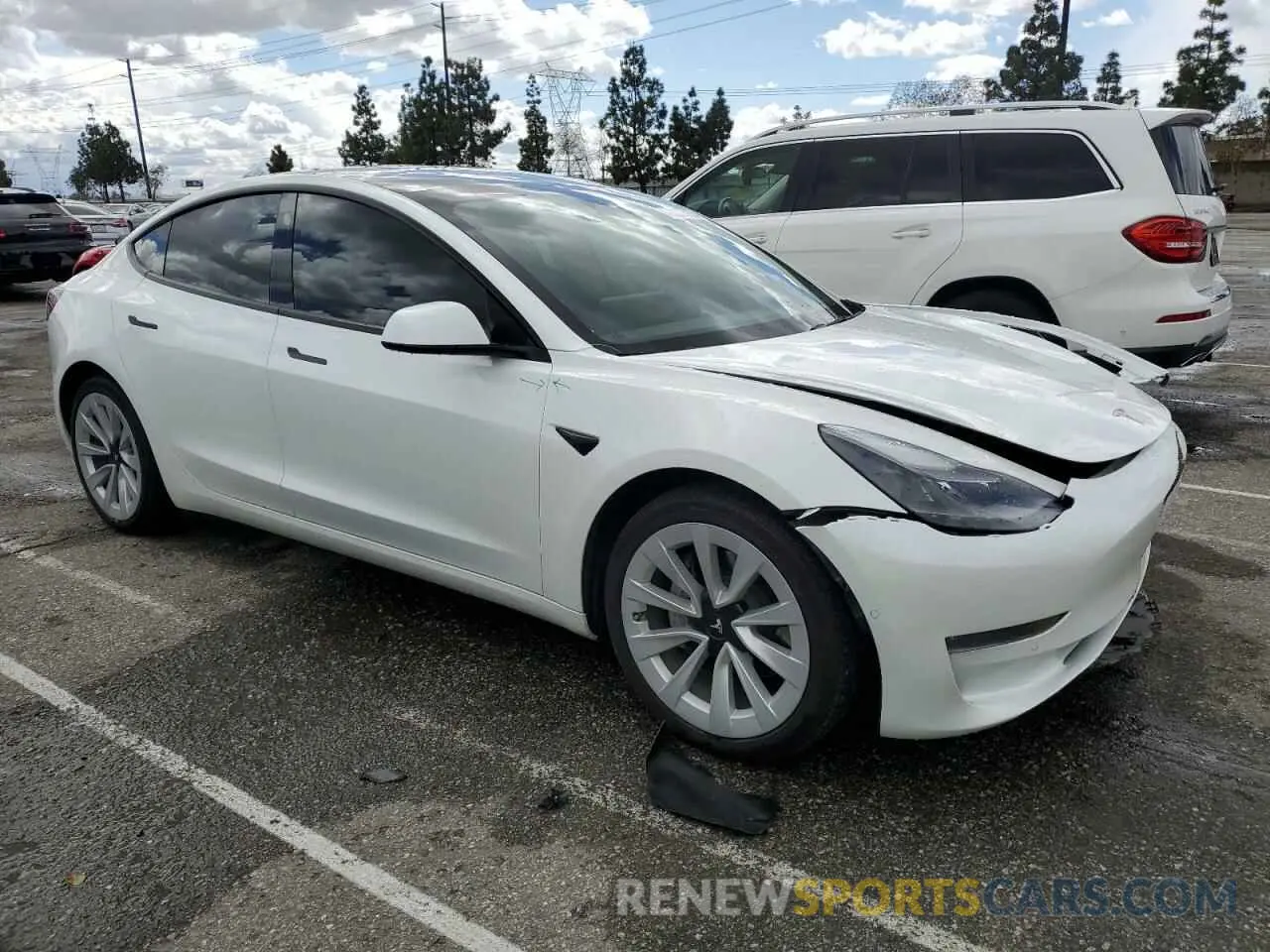 4 Photograph of a damaged car 5YJ3E1EB4NF129995 TESLA MODEL 3 2022