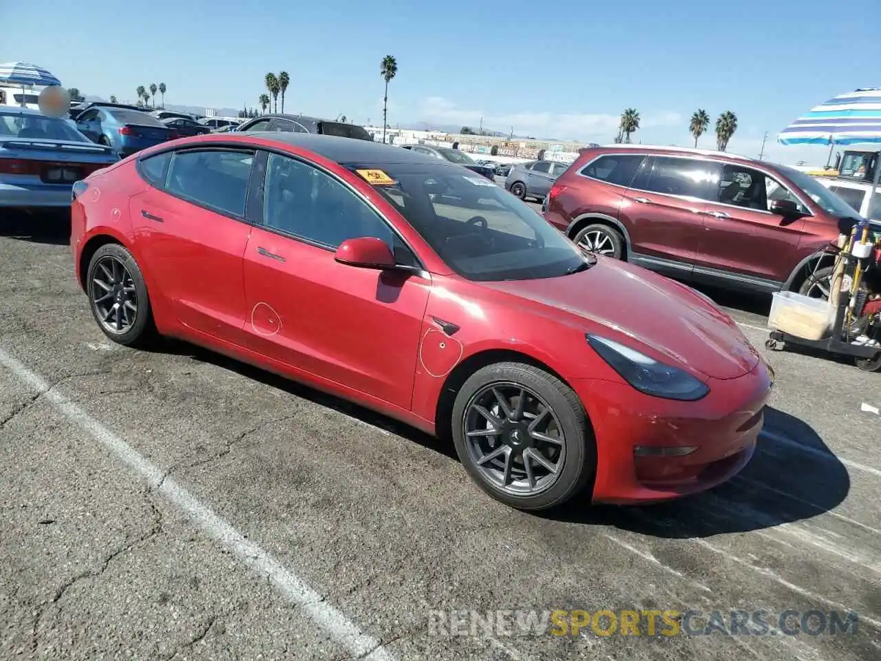 4 Photograph of a damaged car 5YJ3E1EB4NF135943 TESLA MODEL 3 2022