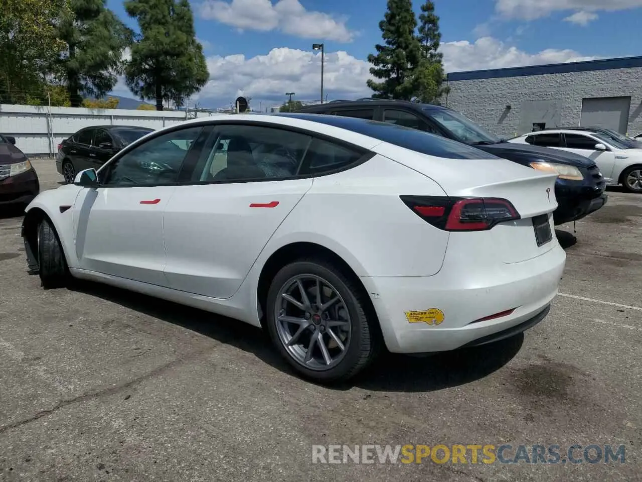 2 Photograph of a damaged car 5YJ3E1EB4NF139023 TESLA MODEL 3 2022
