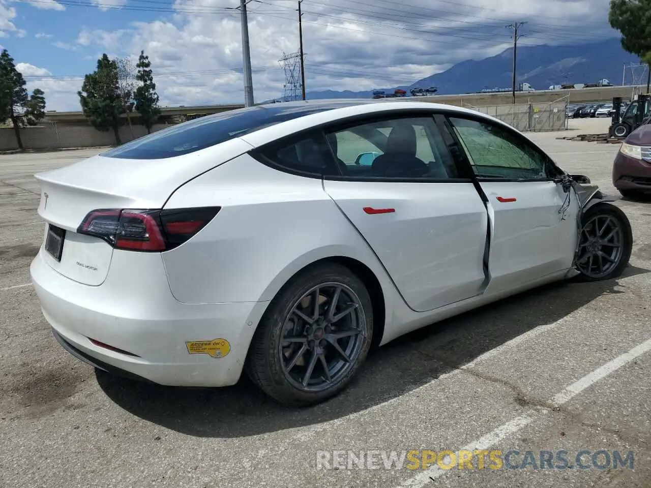 3 Photograph of a damaged car 5YJ3E1EB4NF139023 TESLA MODEL 3 2022