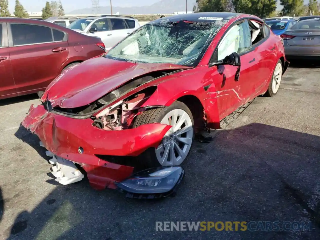 2 Photograph of a damaged car 5YJ3E1EB4NF145002 TESLA MODEL 3 2022