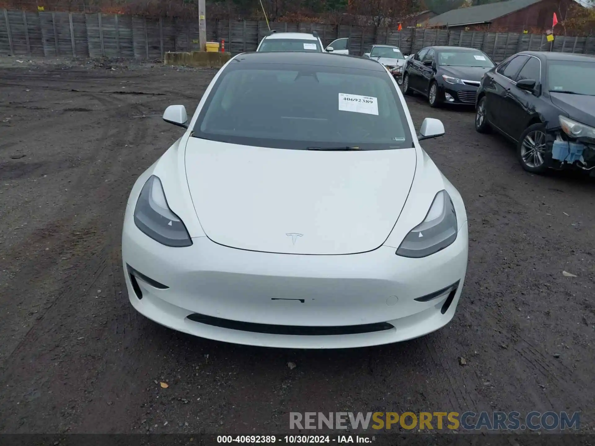 12 Photograph of a damaged car 5YJ3E1EB4NF152435 TESLA MODEL 3 2022