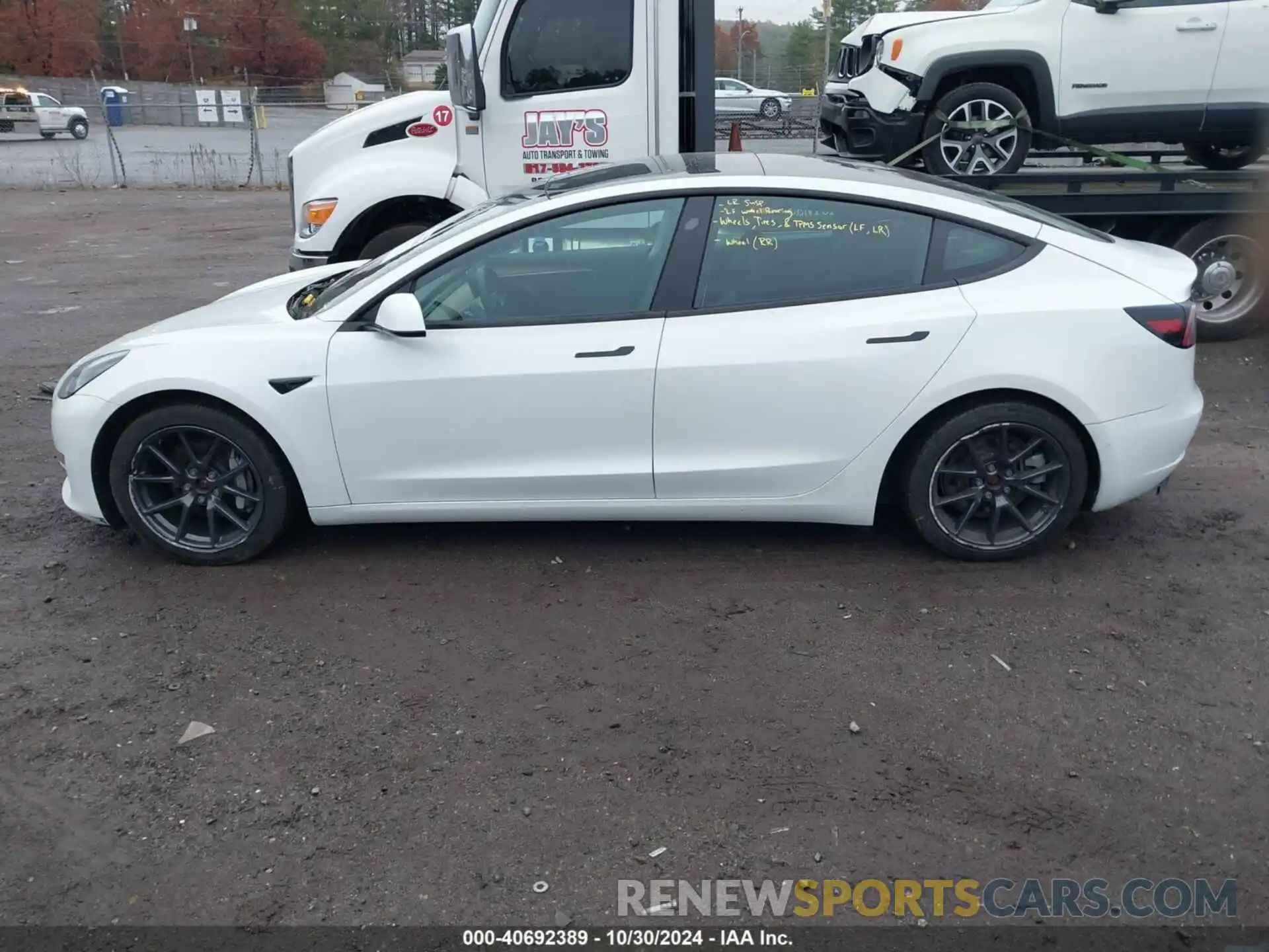 14 Photograph of a damaged car 5YJ3E1EB4NF152435 TESLA MODEL 3 2022