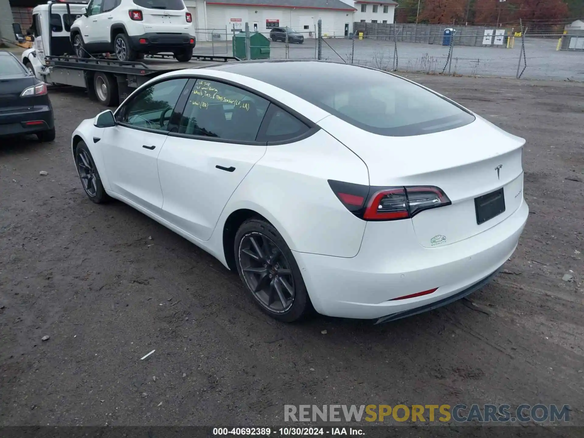 3 Photograph of a damaged car 5YJ3E1EB4NF152435 TESLA MODEL 3 2022