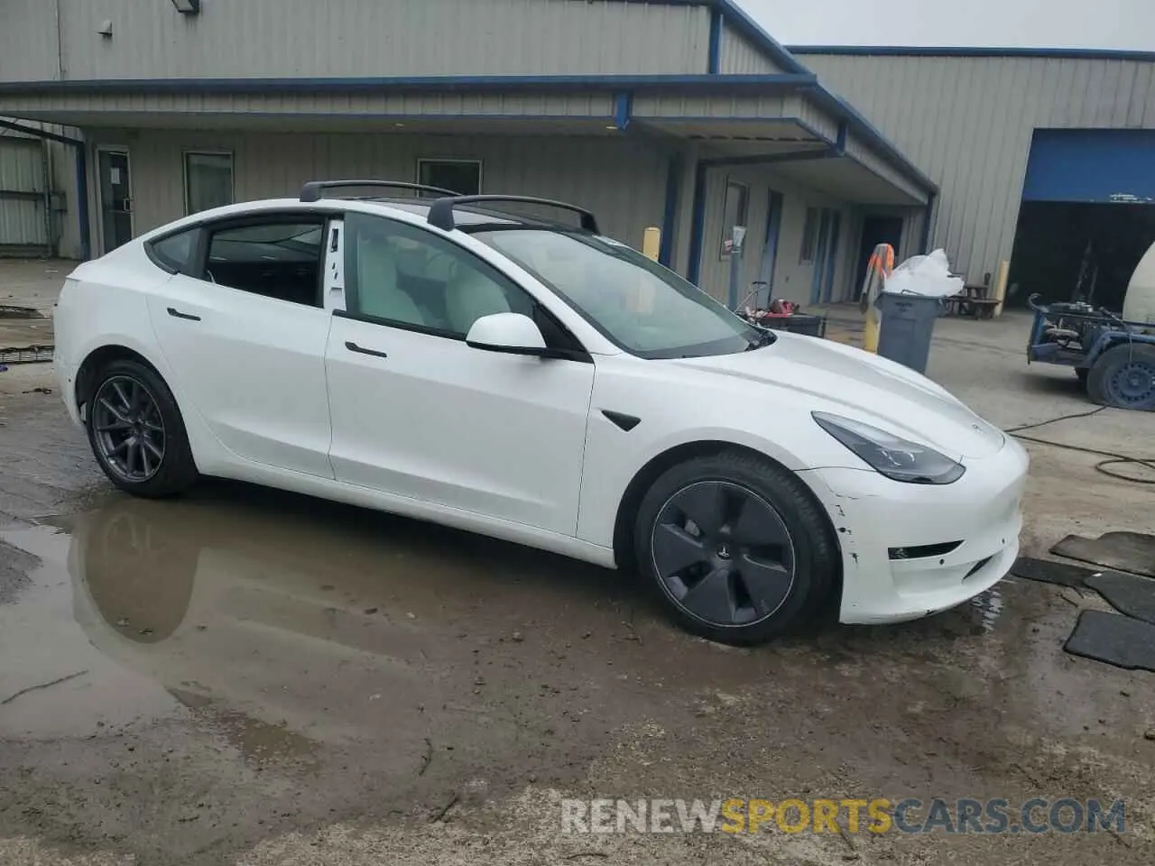 4 Photograph of a damaged car 5YJ3E1EB4NF155108 TESLA MODEL 3 2022
