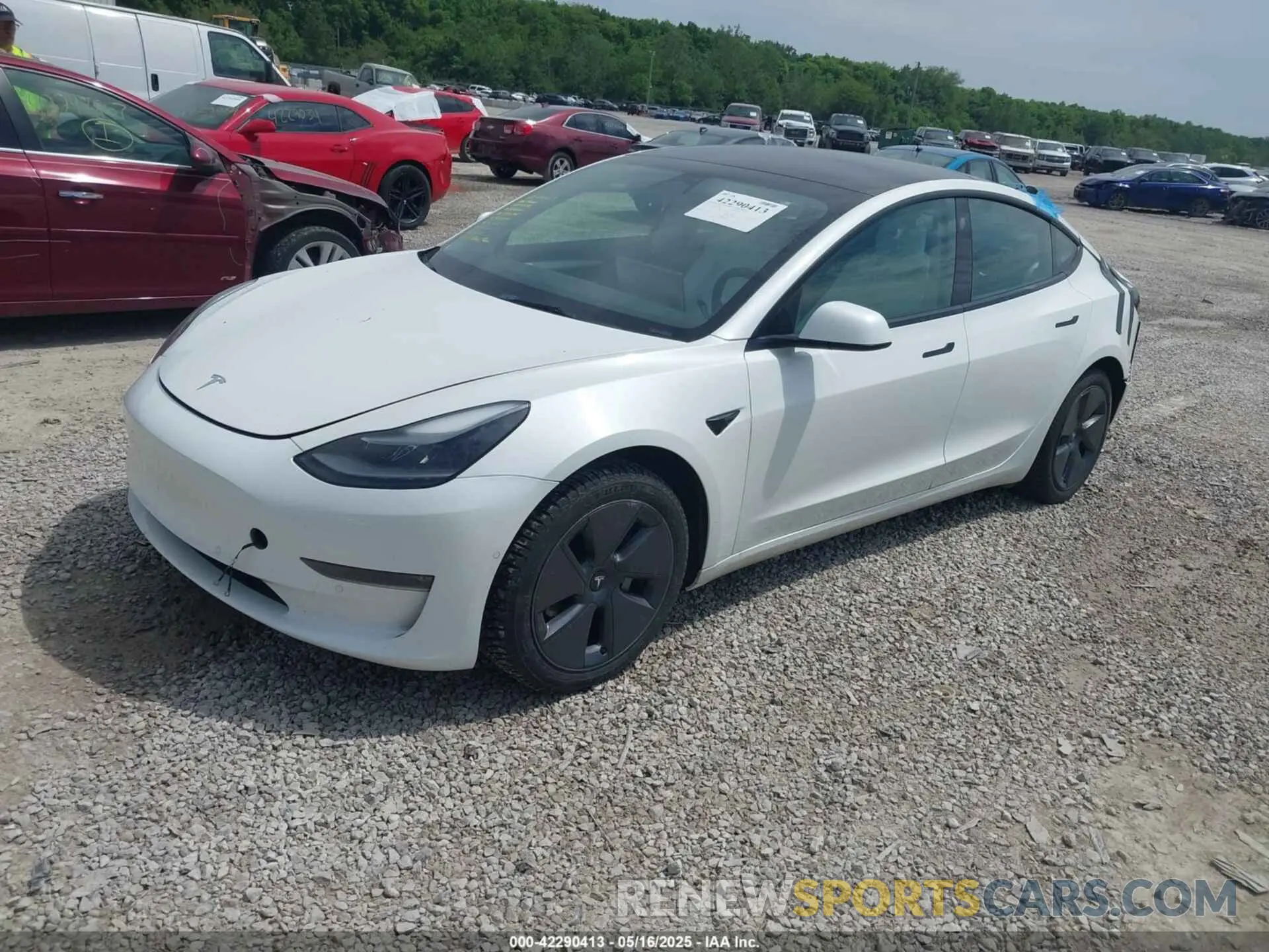 2 Photograph of a damaged car 5YJ3E1EB4NF165427 TESLA MODEL 3 2022