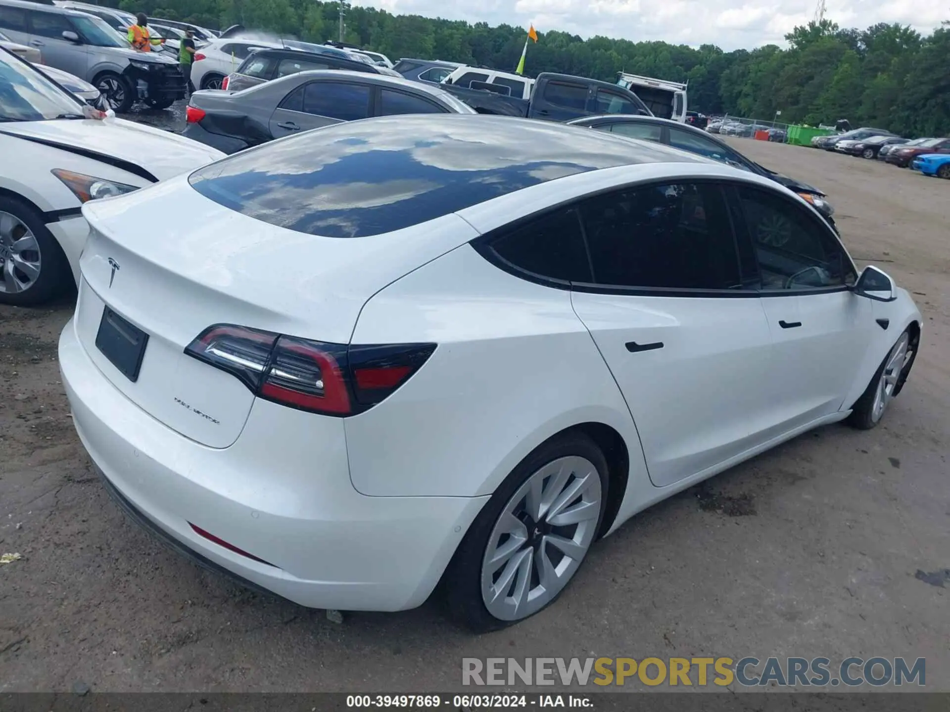 4 Photograph of a damaged car 5YJ3E1EB4NF169445 TESLA MODEL 3 2022