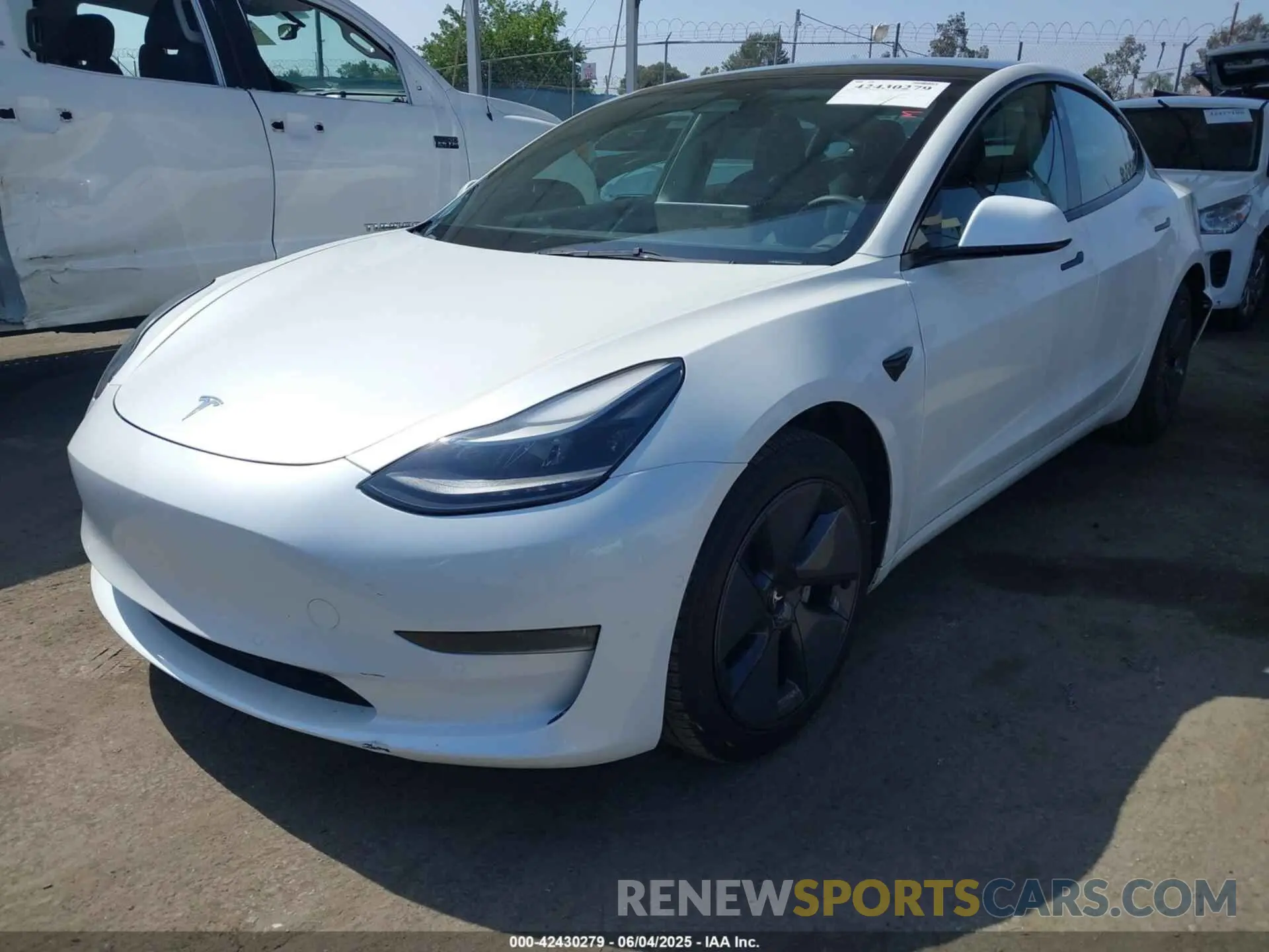 2 Photograph of a damaged car 5YJ3E1EB4NF183958 TESLA MODEL 3 2022