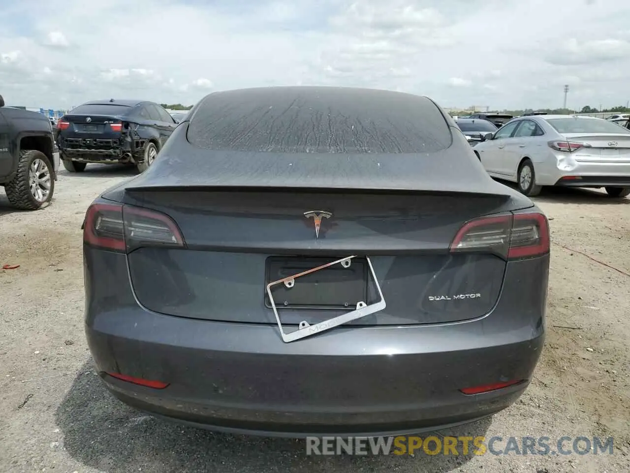 6 Photograph of a damaged car 5YJ3E1EB4NF184589 TESLA MODEL 3 2022