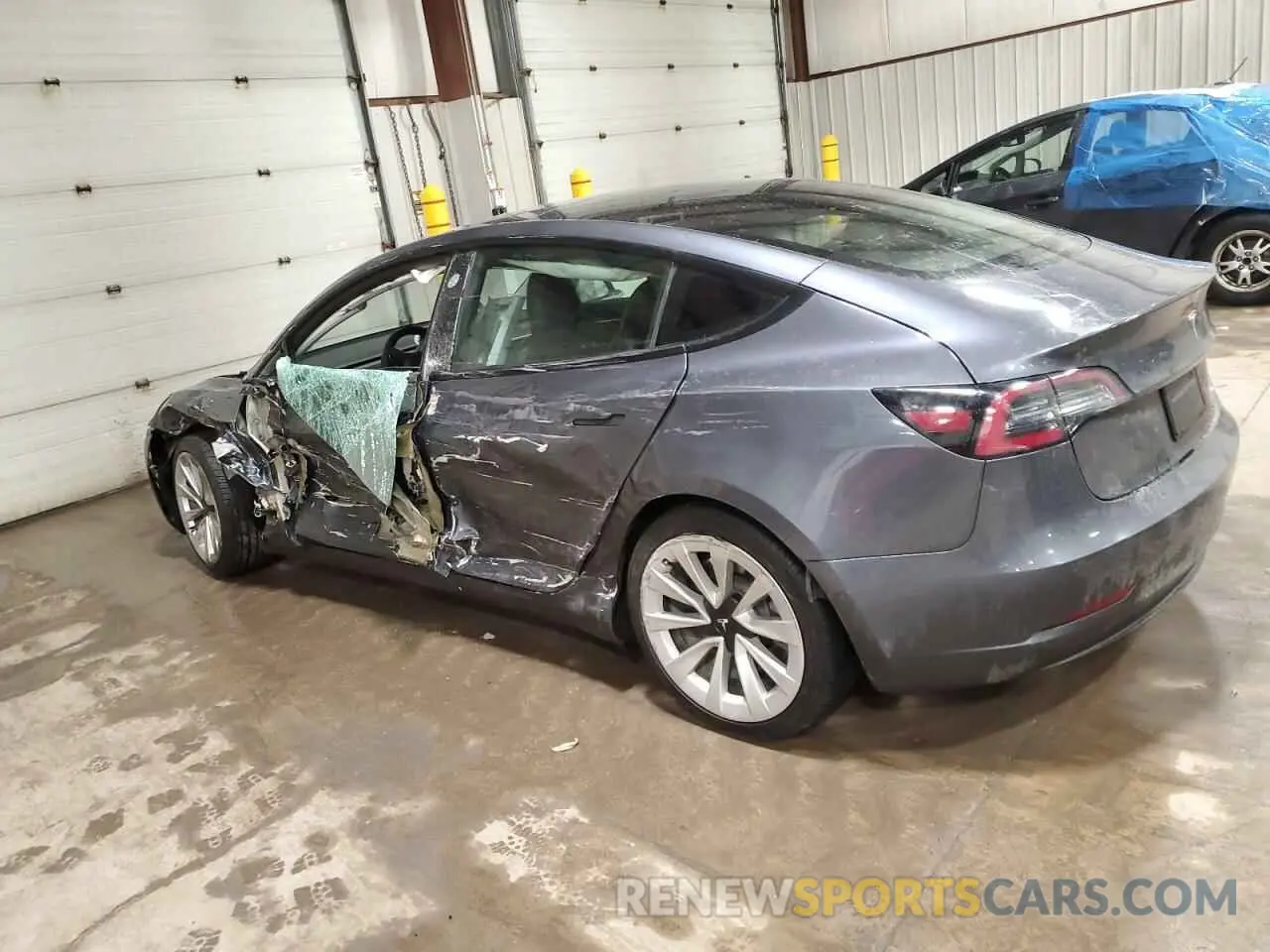2 Photograph of a damaged car 5YJ3E1EB4NF185130 TESLA MODEL 3 2022