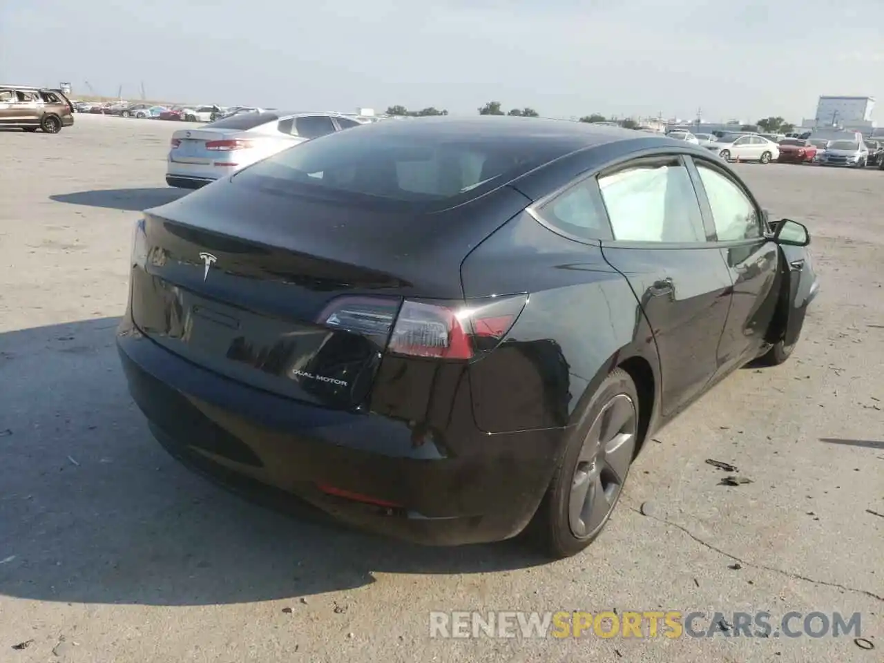 4 Photograph of a damaged car 5YJ3E1EB4NF190375 TESLA MODEL 3 2022