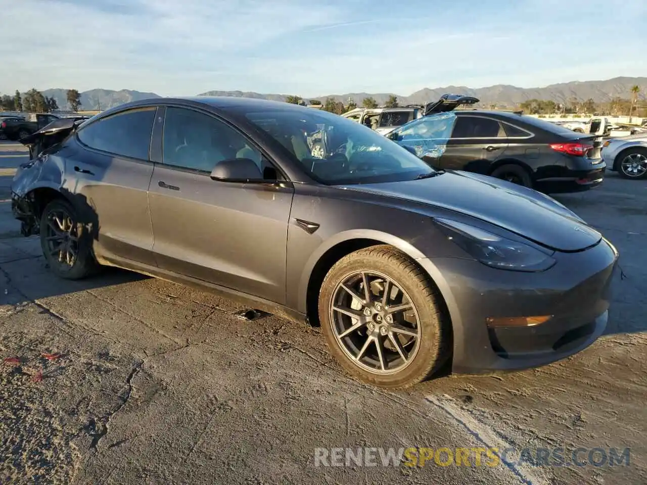 4 Photograph of a damaged car 5YJ3E1EB4NF200676 TESLA MODEL 3 2022