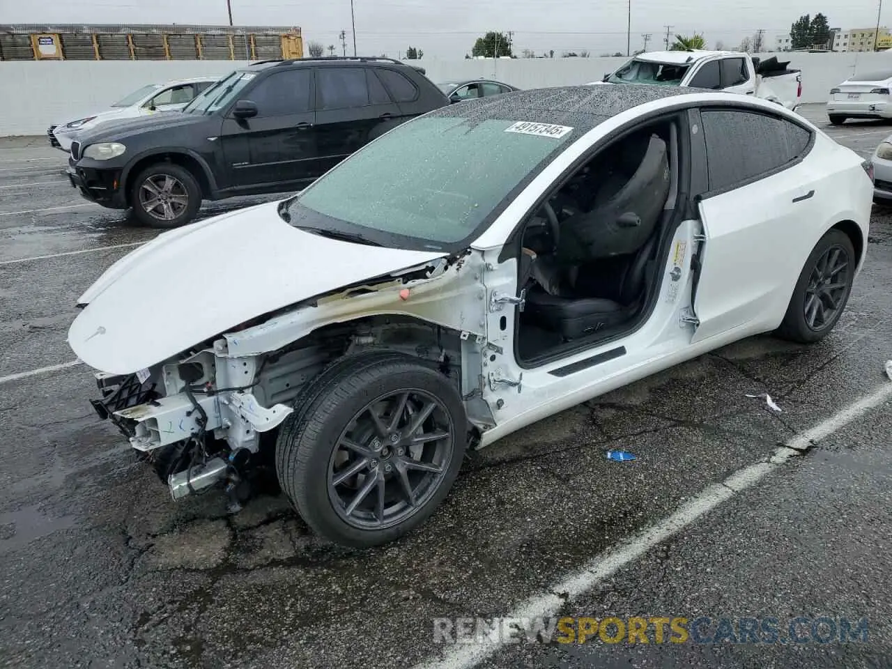 1 Photograph of a damaged car 5YJ3E1EB4NF212763 TESLA MODEL 3 2022