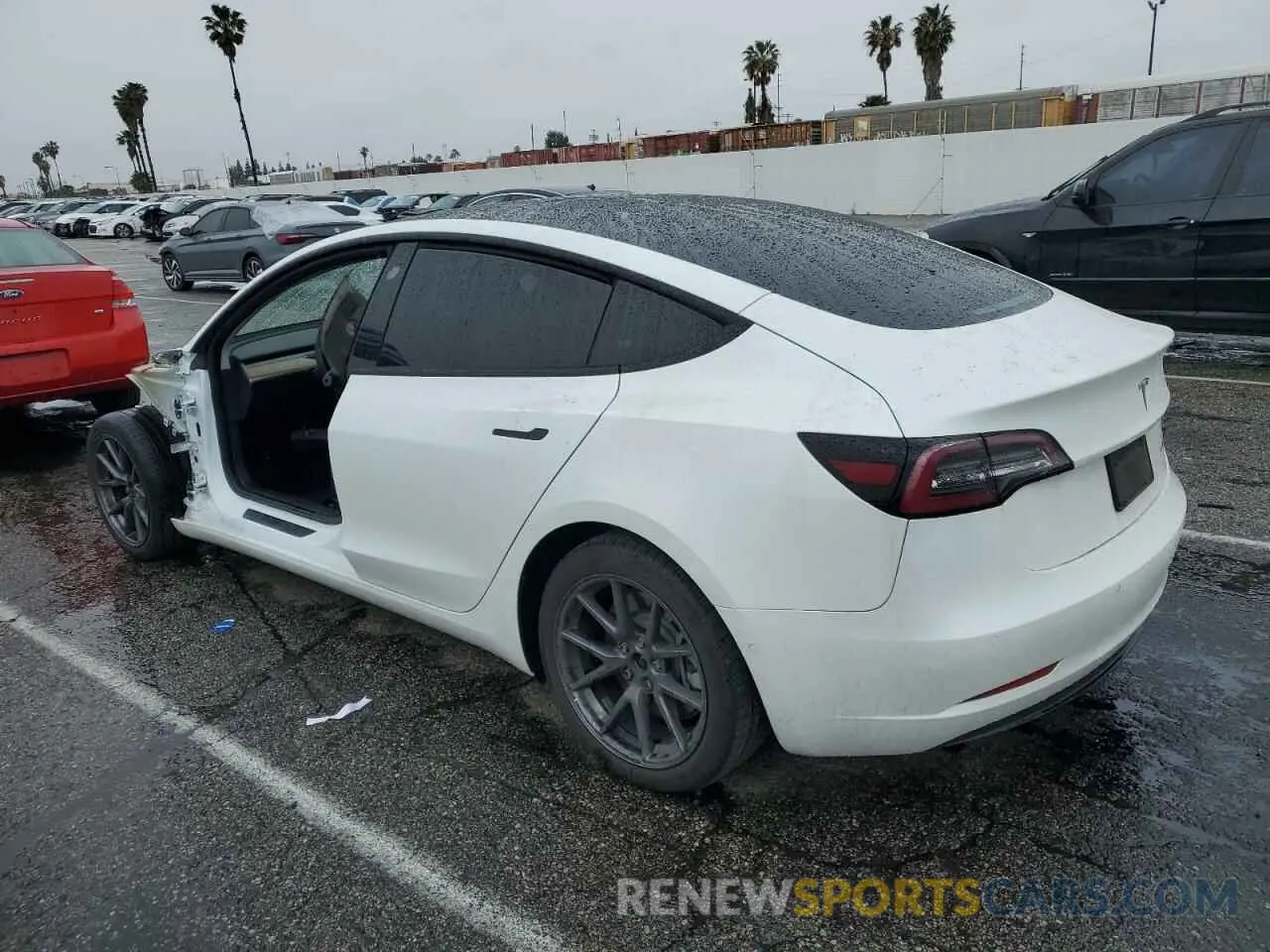 2 Photograph of a damaged car 5YJ3E1EB4NF212763 TESLA MODEL 3 2022